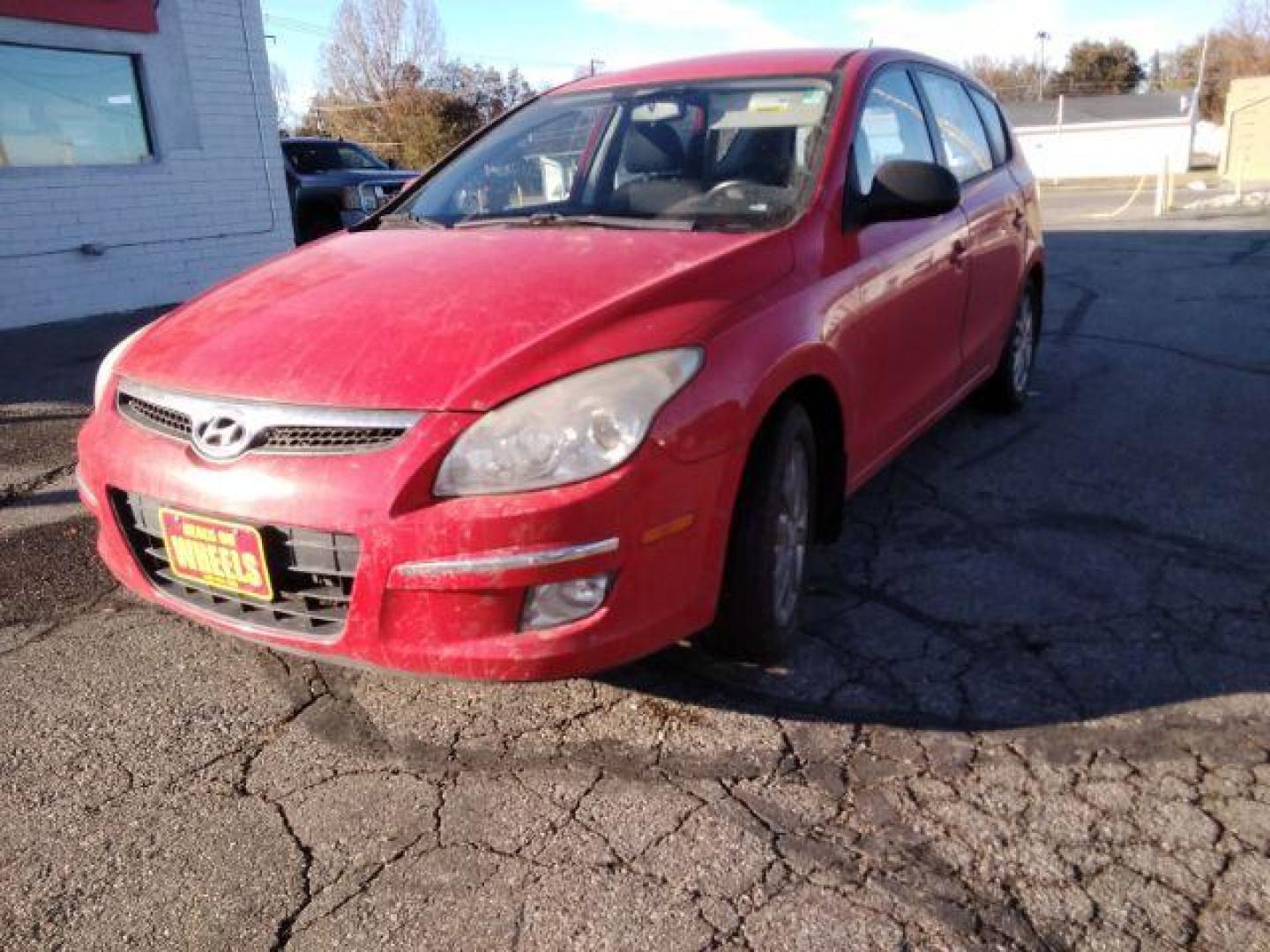 2009 Hyundai Elantra Automatic (KMHDC86E19U) with an 2.0L L4 DOHC 16V engine, 4-Speed Automatic transmission, located at 4047 Montana Ave., Billings, MT, 59101, 45.770847, -108.529800 - Photo#1