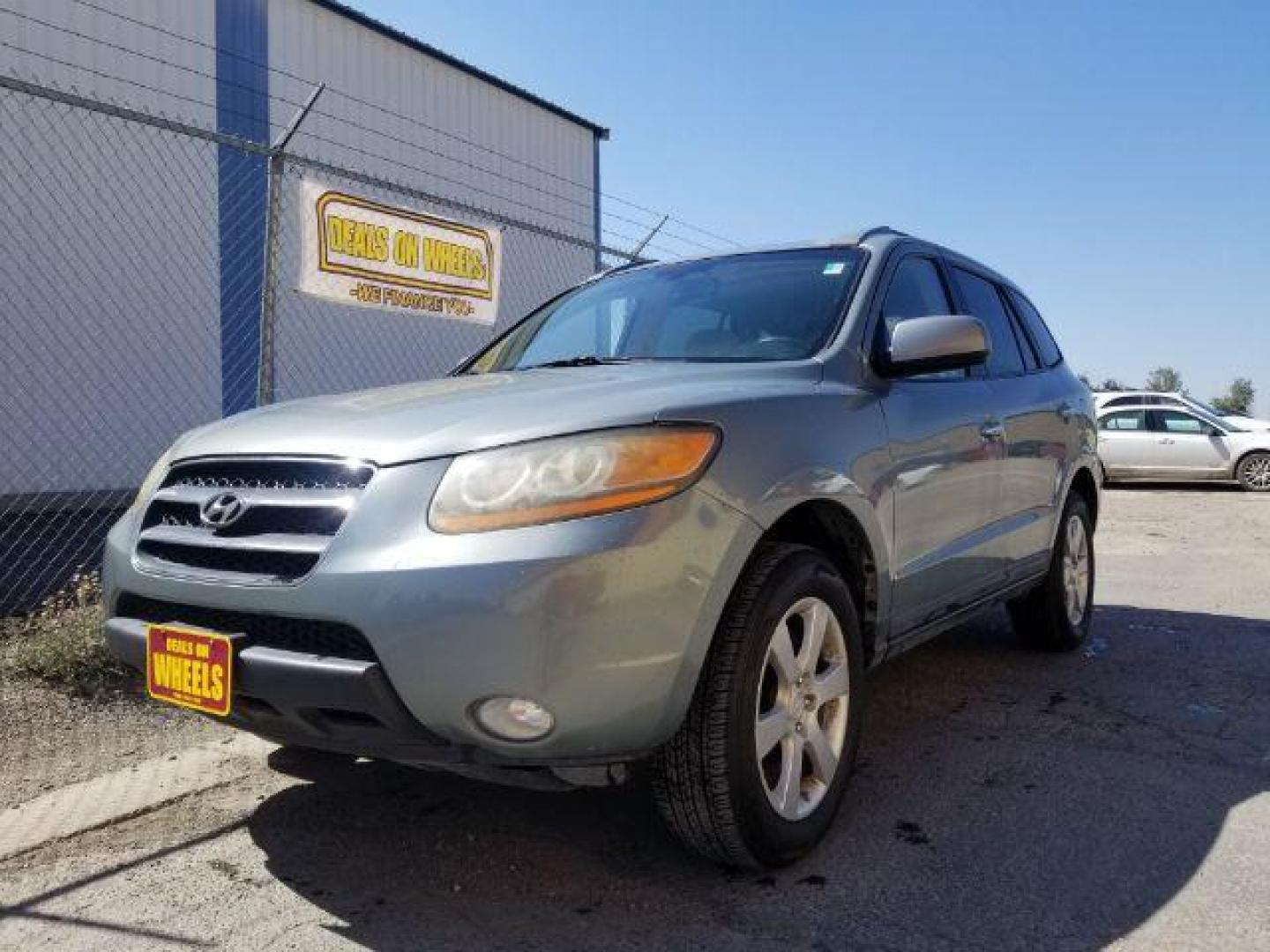 2009 Hyundai Santa Fe SE AWD (5NMSH73E09H) with an 3.3L V6 DOHC 24V engine, 5-Speed Automatic transmission, located at 1800 West Broadway, Missoula, 59808, (406) 543-1986, 46.881348, -114.023628 - Photo#0