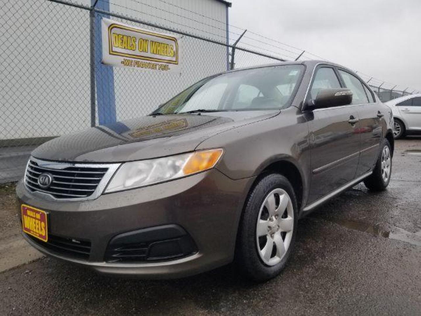 2009 Kia Optima EX (KNAGE228795) with an 2.4L L4 DOHC 16V engine, 4-Speed Automatic transmission, located at 1800 West Broadway, Missoula, 59808, (406) 543-1986, 46.881348, -114.023628 - Photo#13