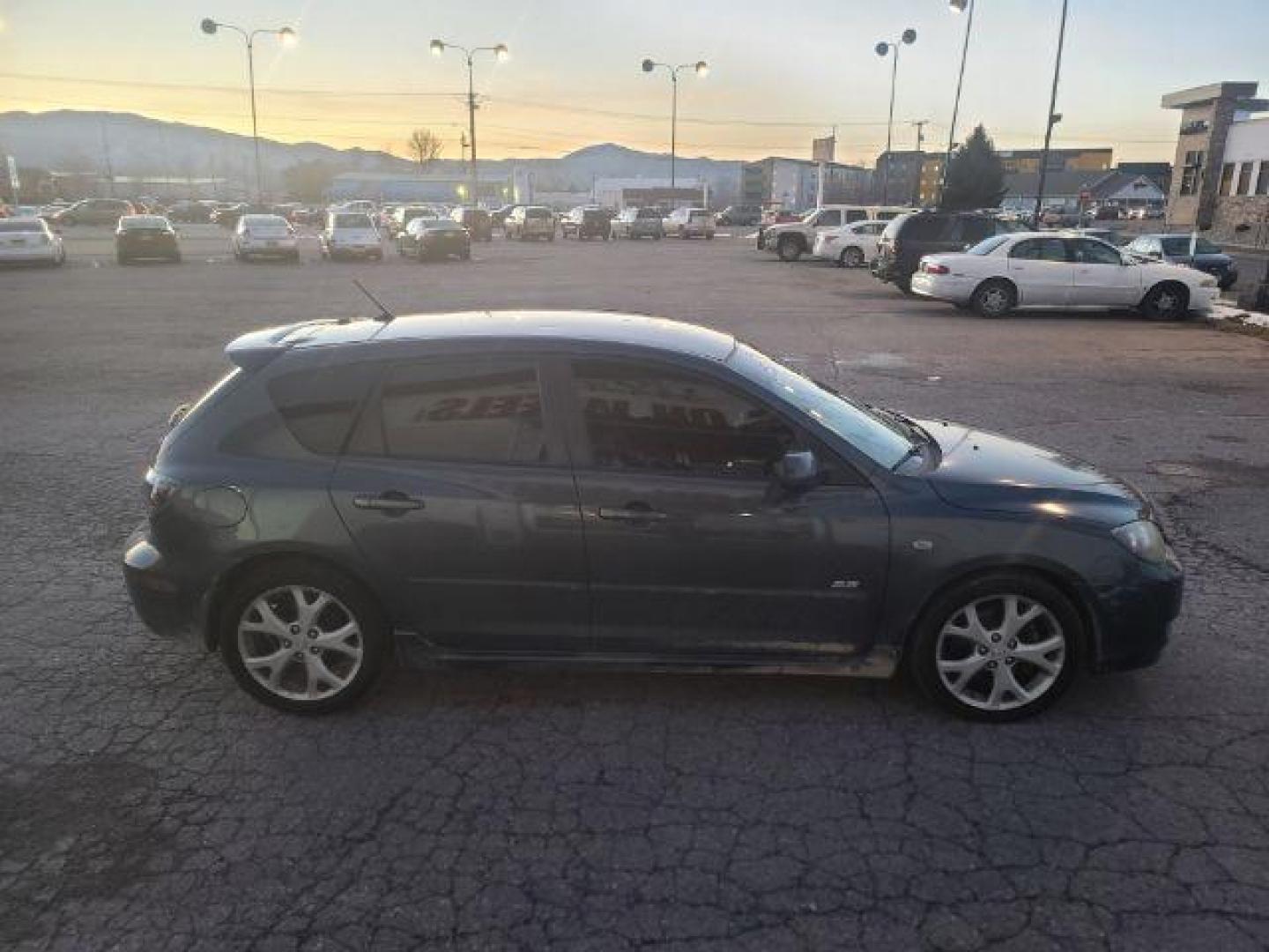 2009 Mazda MAZDA3 s Touring 5-Door (JM1BK344X91) with an 2.3L L4 DOHC 16V engine, located at 1800 West Broadway, Missoula, 59808, (406) 543-1986, 46.881348, -114.023628 - Photo#2