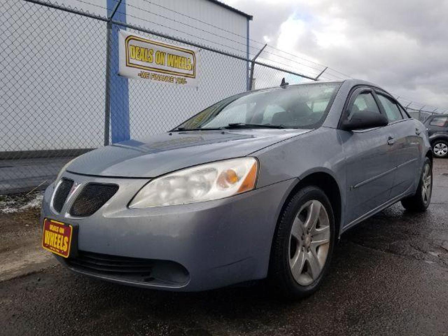 2009 Pontiac G6 Sedan (1G2ZG57BX94) with an 2.4L L4 DOHC 16V engine, 4-Speed Automatic transmission, located at 4801 10th Ave S,, Great Falls, MT, 59405, (406) 564-1505, 0.000000, 0.000000 - Photo#0