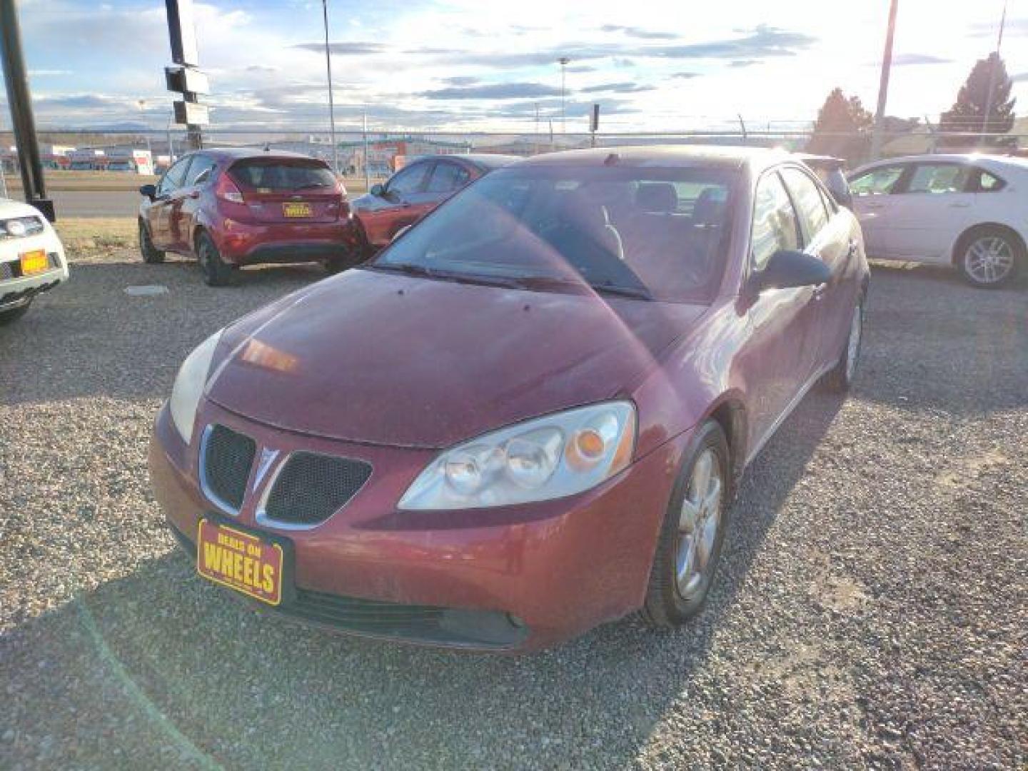 2009 Performance Red Tintcoat Pontiac G6 GT Sedan (1G2ZH57N294) with an 3.5L V6 OHV 12V engine, 4-Speed Automatic transmission, located at 4801 10th Ave S,, Great Falls, MT, 59405, (406) 564-1505, 0.000000, 0.000000 - Photo#0