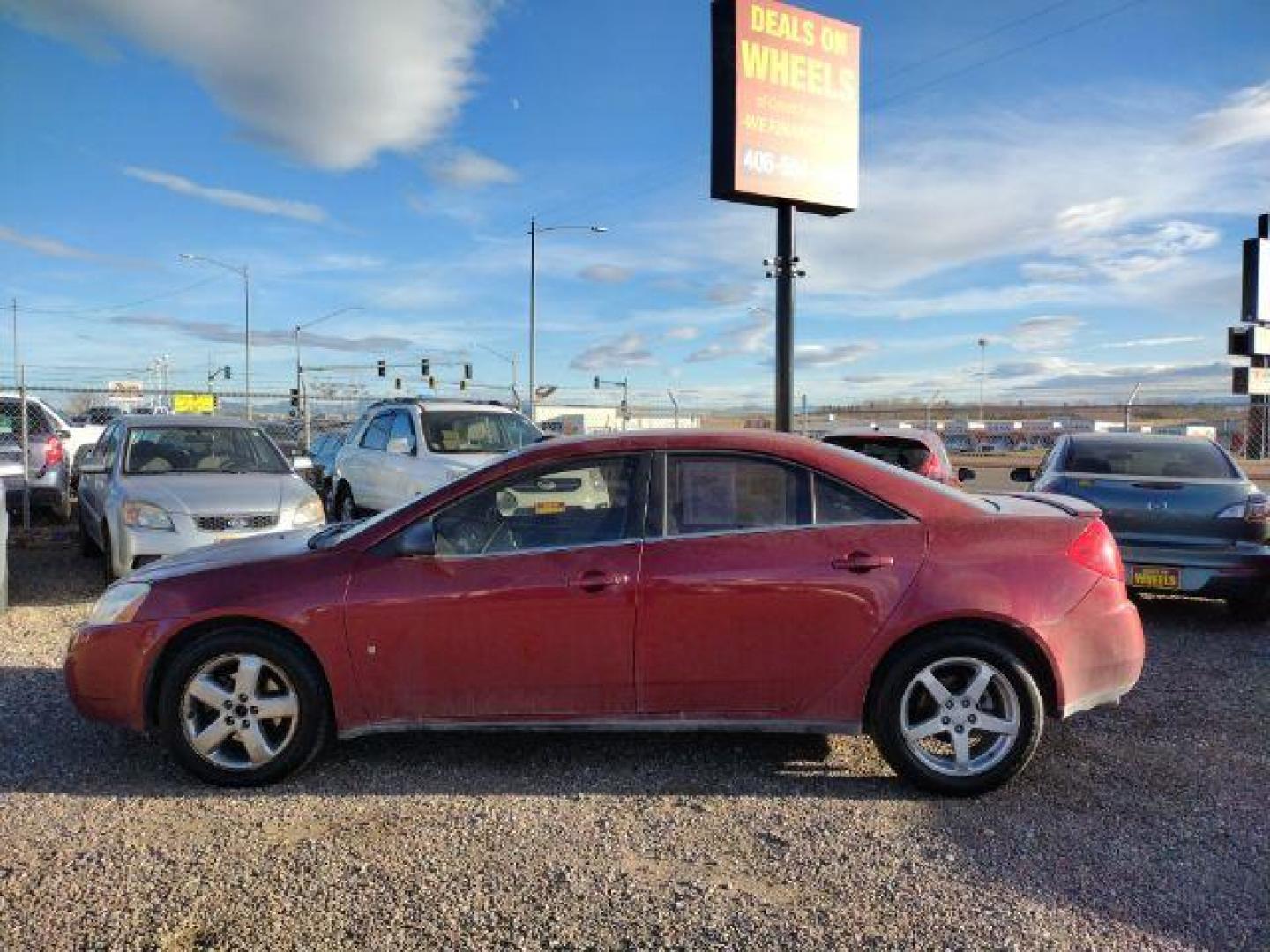 2009 Performance Red Tintcoat Pontiac G6 GT Sedan (1G2ZH57N294) with an 3.5L V6 OHV 12V engine, 4-Speed Automatic transmission, located at 4801 10th Ave S,, Great Falls, MT, 59405, (406) 564-1505, 0.000000, 0.000000 - Photo#1