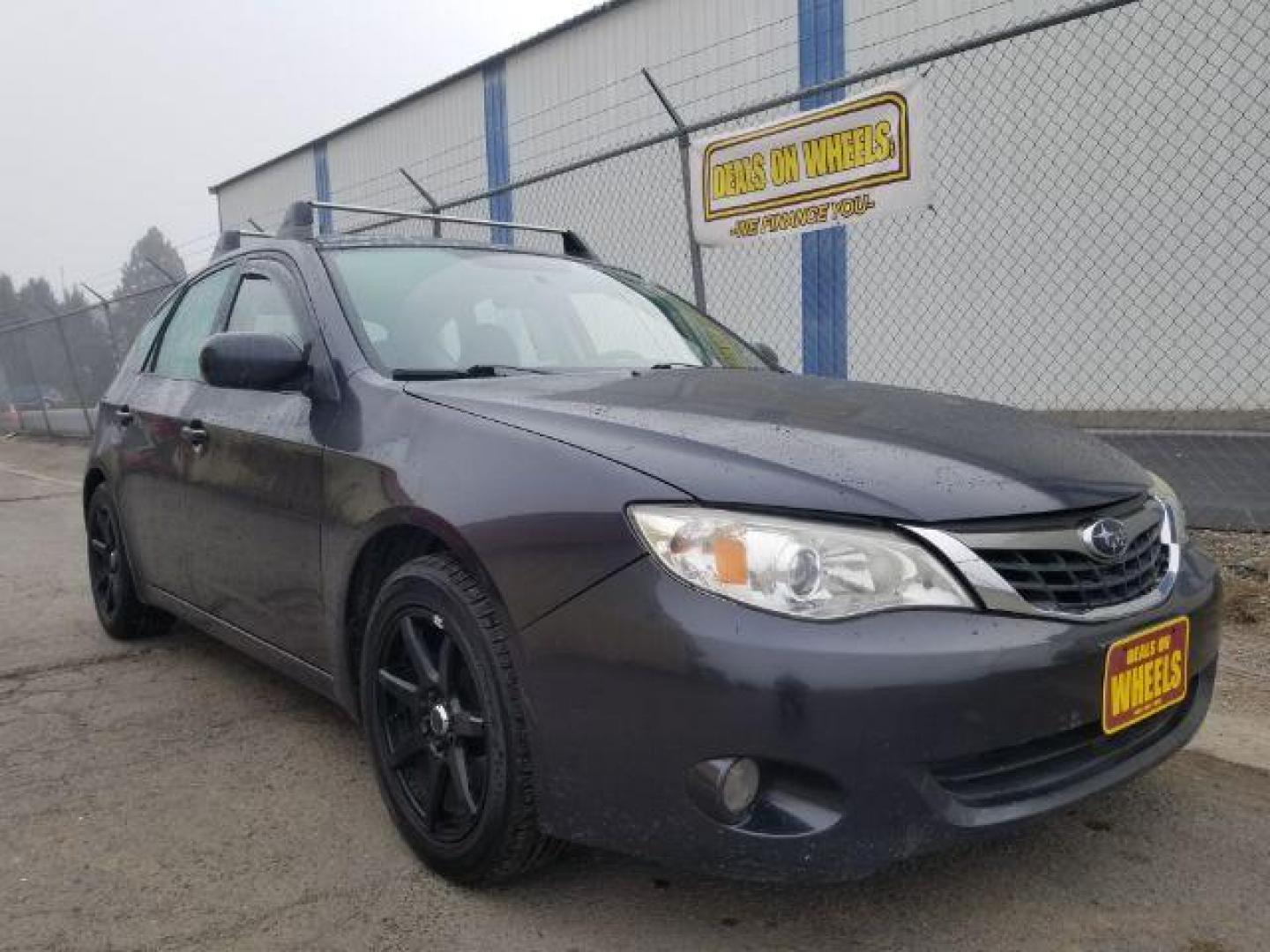 2009 Subaru Impreza 2.5i Premium 5-Door (JF1GH60679H) with an 2.5L H4 SOHC 16V engine, located at 601 E. Idaho St., Kalispell, MT, 59901, 0.000000, 0.000000 - Photo#2