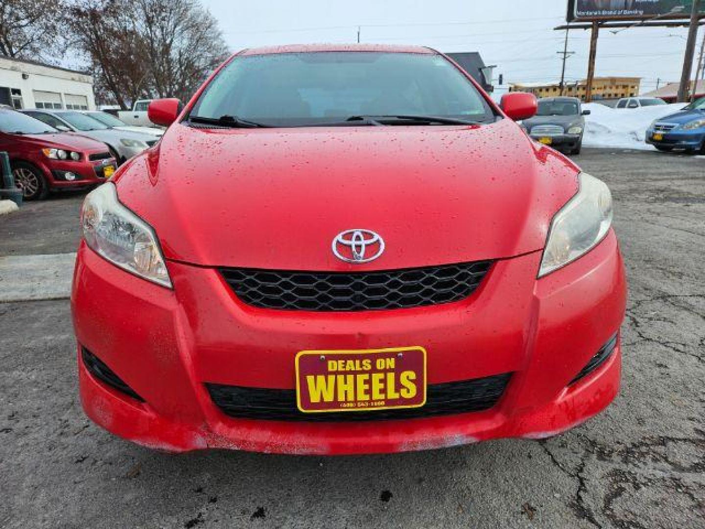 2009 Radiant Red Toyota Matrix Base 5-Speed MT (2T1KU40E09C) with an 1.8L L4 DOHC 16V engine, 5-Speed Manual transmission, located at 601 E. Idaho St., Kalispell, MT, 59901, 0.000000, 0.000000 - Photo#7