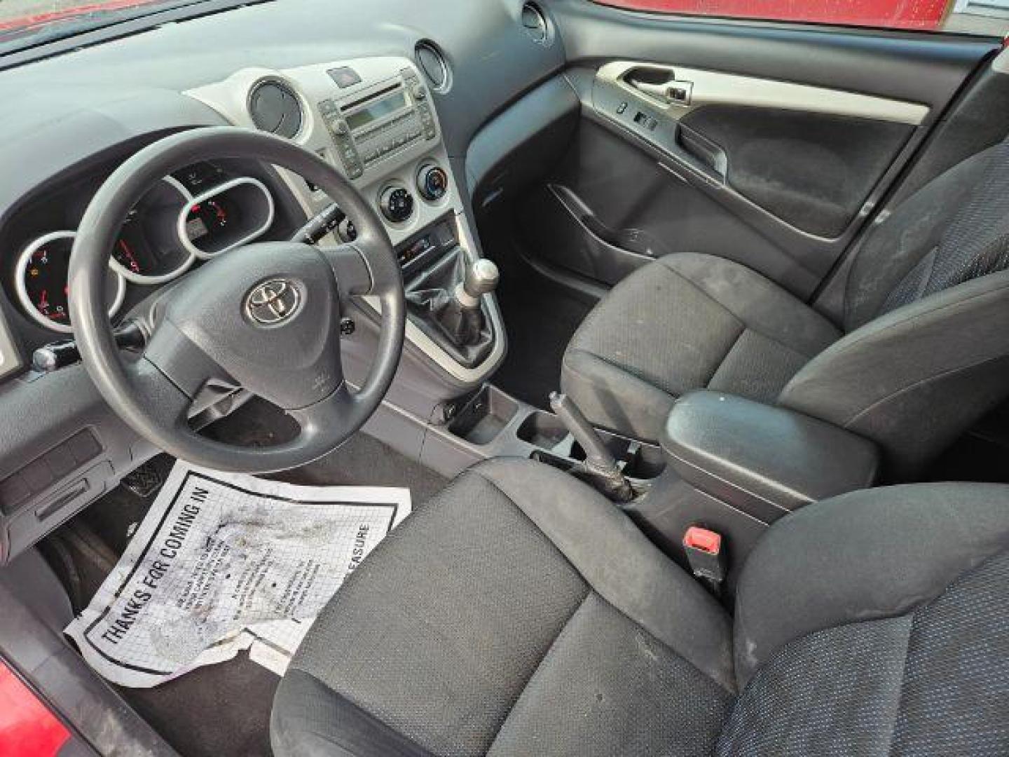 2009 Radiant Red Toyota Matrix Base 5-Speed MT (2T1KU40E09C) with an 1.8L L4 DOHC 16V engine, 5-Speed Manual transmission, located at 601 E. Idaho St., Kalispell, MT, 59901, 0.000000, 0.000000 - Photo#8