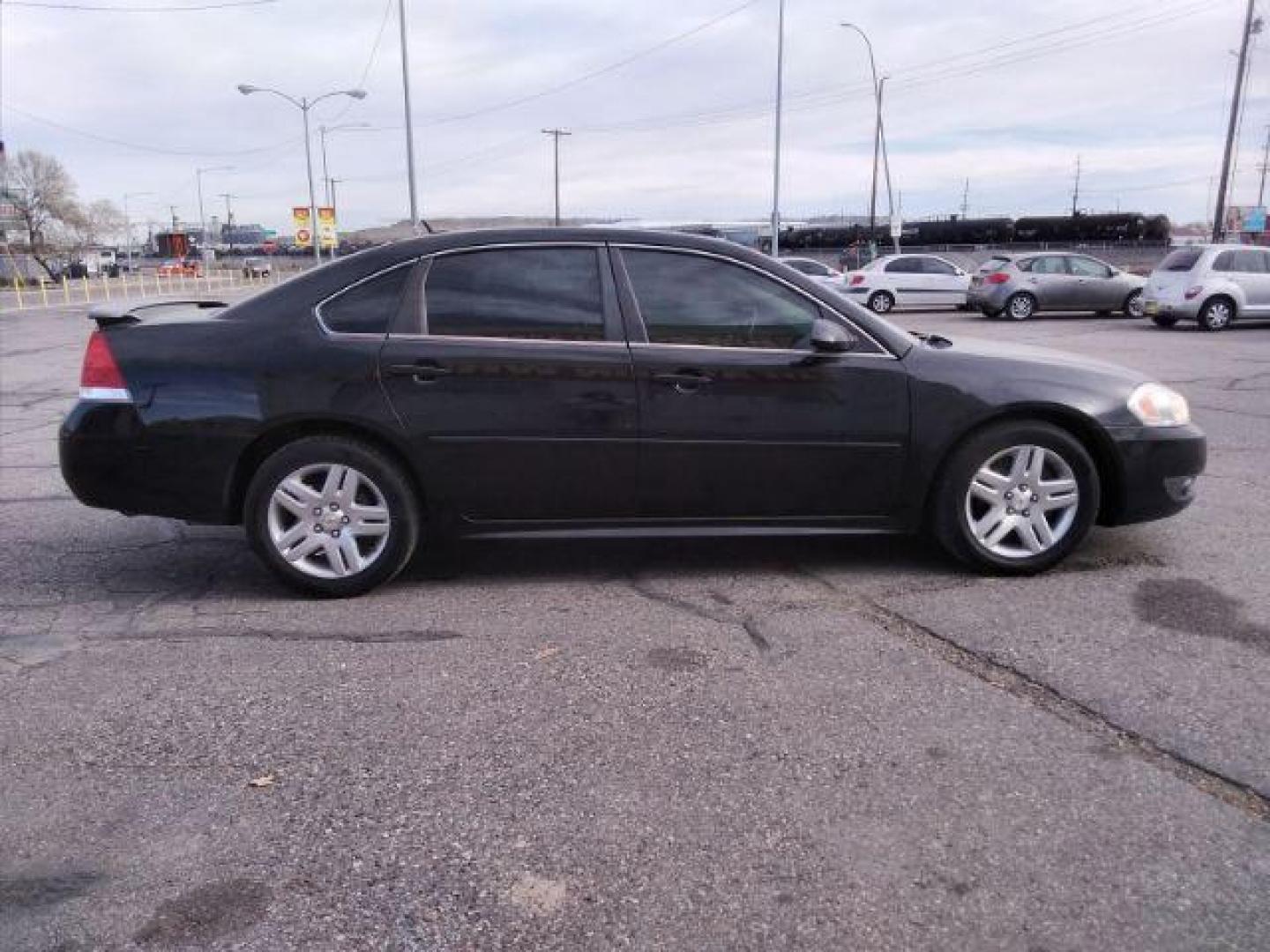 2010 Chevrolet Impala LT (2G1WB5EK4A1) with an 3.5L V6 OHV 12V FFV engine, 4-Speed Automatic transmission, located at 4047 Montana Ave., Billings, MT, 59101, 45.770847, -108.529800 - Photo#3