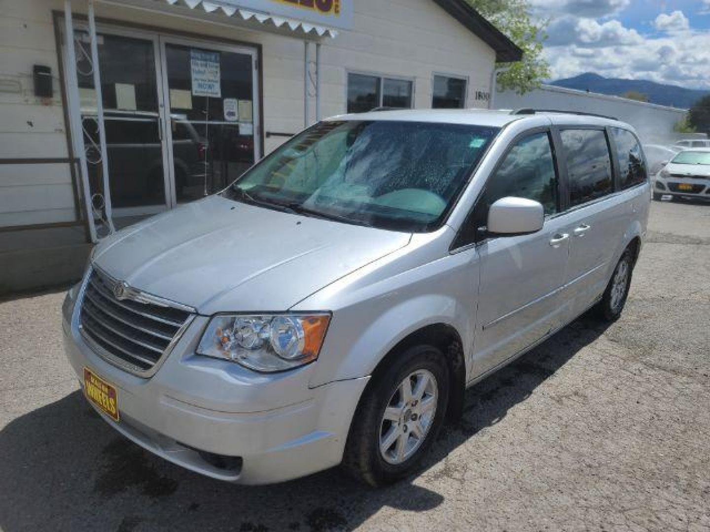 2010 Bright Silver Metall Chrysler Town and Country Touring (2A4RR5D17AR) with an 3.8L V6 OHV 12V engine, 6-Speed Automatic transmission, located at 1800 West Broadway, Missoula, 59808, (406) 543-1986, 46.881348, -114.023628 - Photo#0