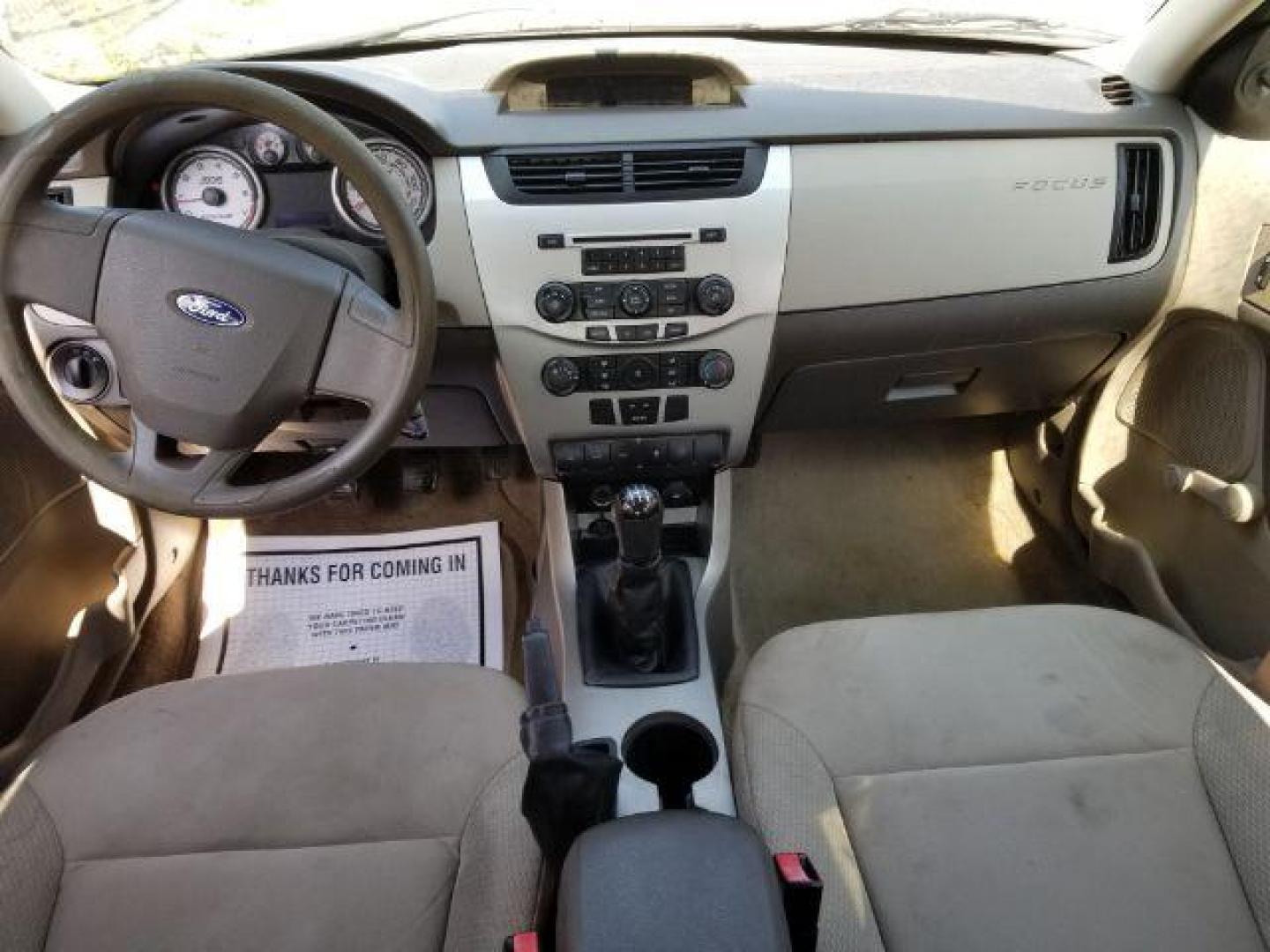 2010 /Medium Stone Cloth Interior Ford Focus S Sedan (1FAHP3EN5AW) with an 2.0L L4 DOHC 16V engine, 5-Speed Manual transmission, located at 4801 10th Ave S,, Great Falls, MT, 59405, (406) 564-1505, 0.000000, 0.000000 - Photo#10