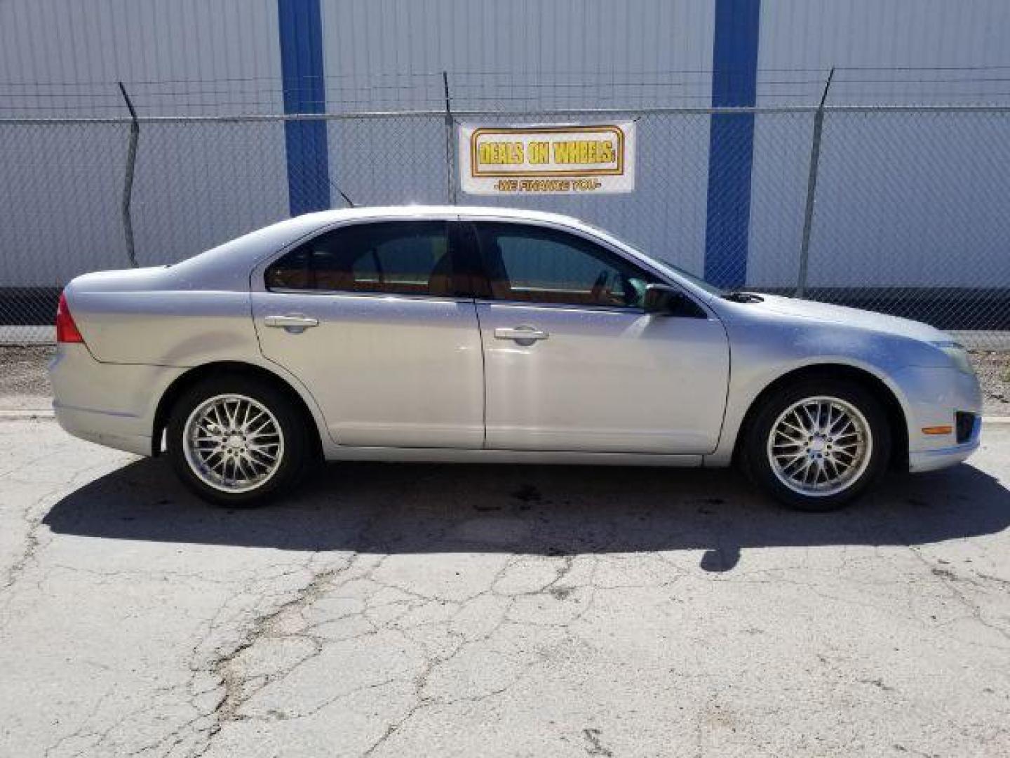 2010 Ford Fusion V6 SEL AWD (3FAHP0CG4AR) with an 3.0L V6 DOHC 24V engine, located at 4047 Montana Ave., Billings, MT, 59101, 45.770847, -108.529800 - Photo#5