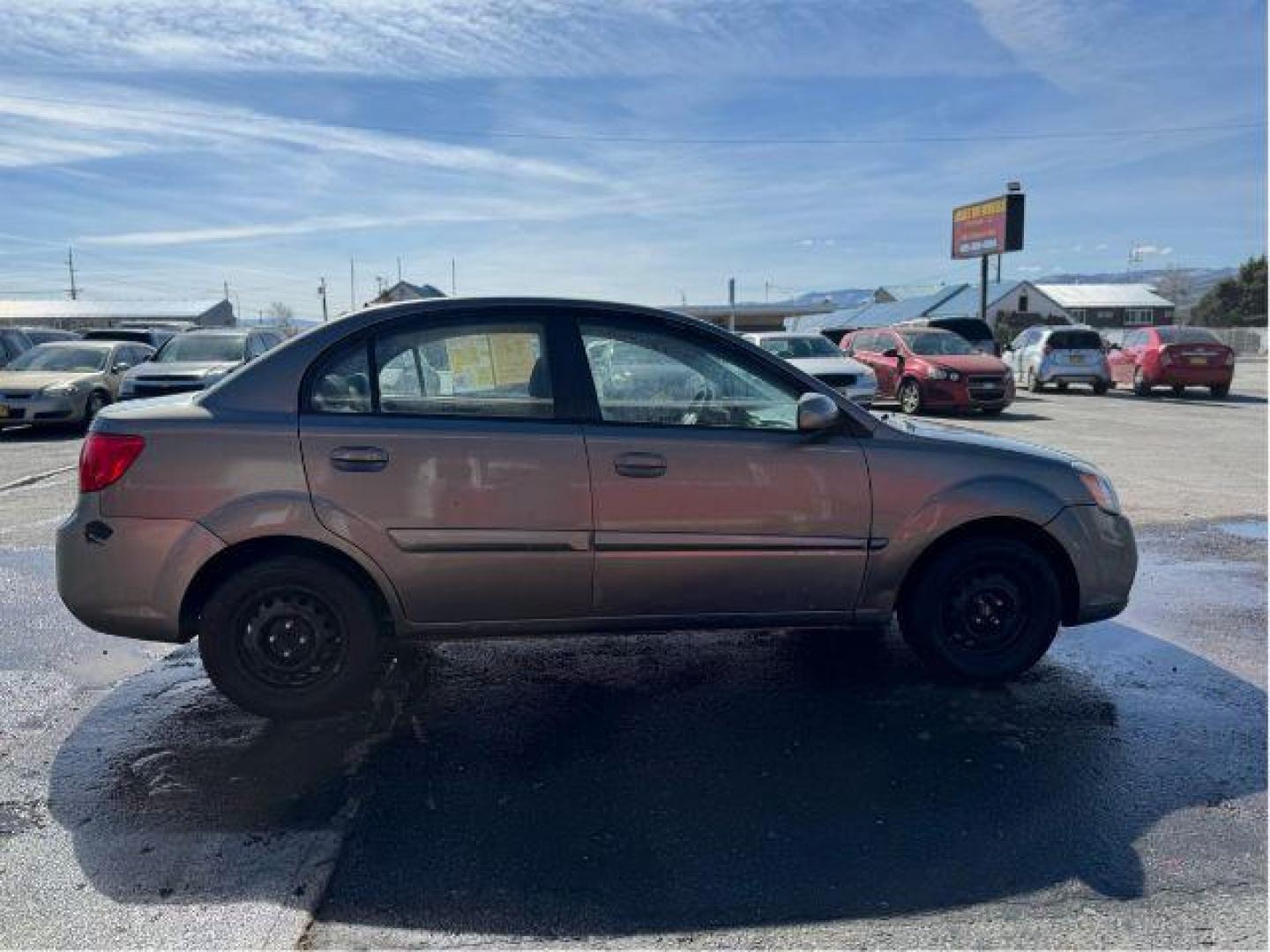 2010 Kia Rio LX (KNADH4A31A6) with an 1.6L L4 DOHC 16V engine, located at 601 E. Idaho St., Kalispell, MT, 59901, 0.000000, 0.000000 - Photo#1