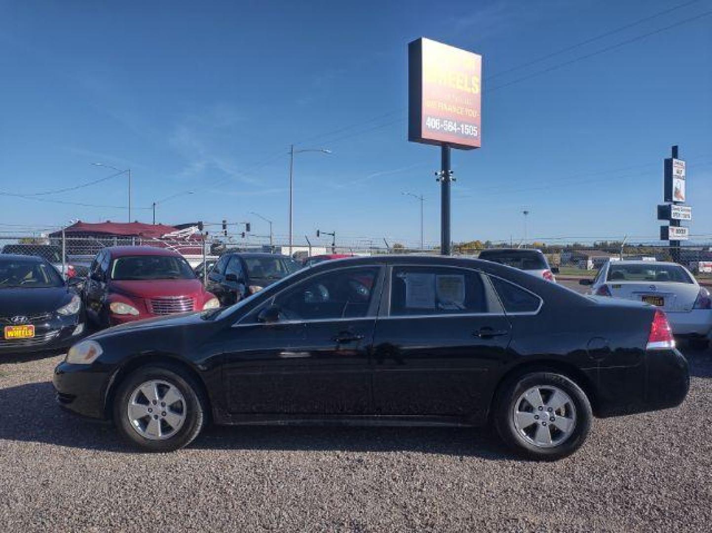 2011 Chevrolet Impala LS (2G1WF5EK8B1) with an 3.5L V6 OHV 16V FFV engine, 4-Speed Automatic transmission, located at 4801 10th Ave S,, Great Falls, MT, 59405, (406) 564-1505, 0.000000, 0.000000 - Photo#1