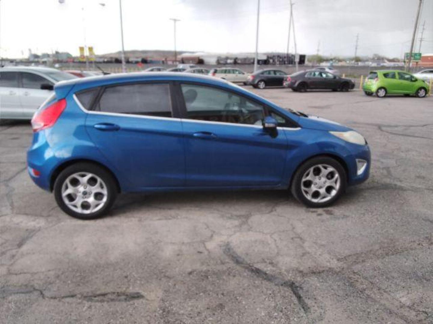 2011 Ford Fiesta SES Hatchback (3FADP4FJ6BM) with an 1.6L L4 DOHC 16V engine, located at 4047 Montana Ave., Billings, MT, 59101, 45.770847, -108.529800 - Photo#5