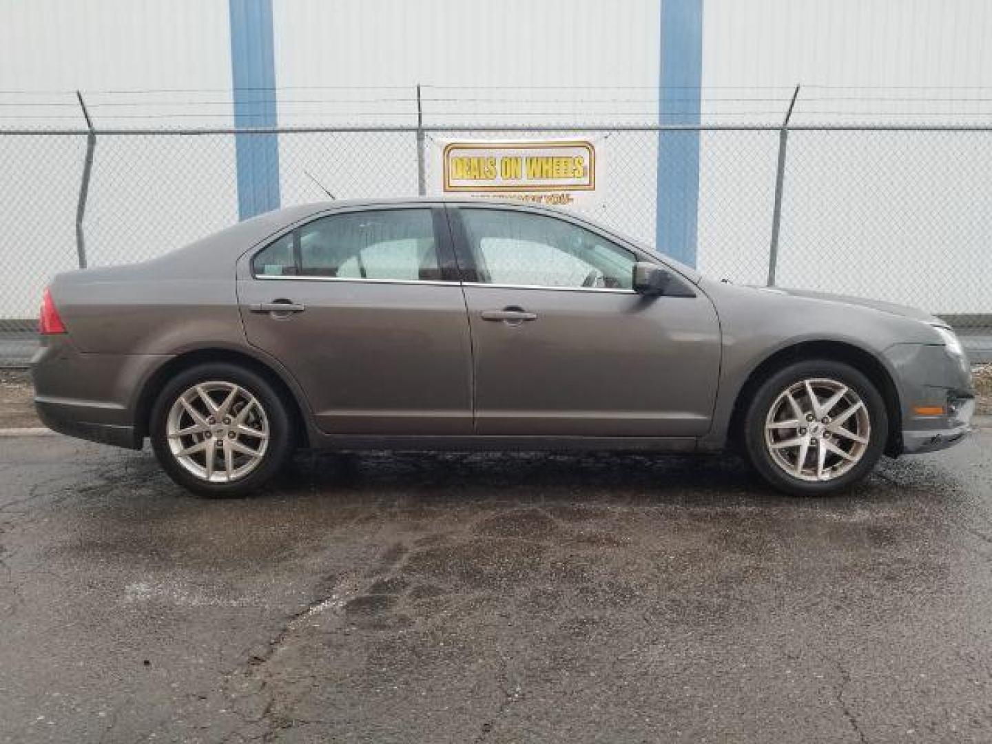 2011 Ford Fusion V6 SEL (3FAHP0JG4BR) with an 3.0L V6 DOHC 24V engine, located at 4801 10th Ave S,, Great Falls, MT, 59405, (406) 564-1505, 0.000000, 0.000000 - Photo#3