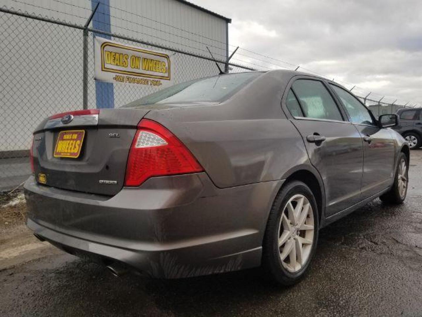 2011 Ford Fusion V6 SEL (3FAHP0JG4BR) with an 3.0L V6 DOHC 24V engine, located at 4801 10th Ave S,, Great Falls, MT, 59405, (406) 564-1505, 0.000000, 0.000000 - Photo#4