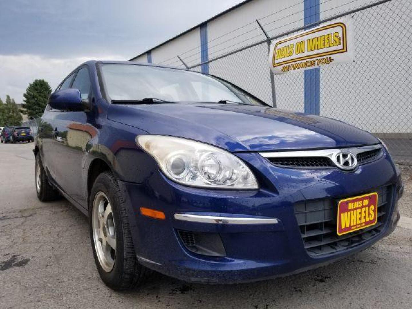 2011 Hyundai Elantra Touring SE Manual (KMHDB8AE0BU) with an 2.0L L4 DOHC 16V engine, 5-Speed Manual transmission, located at 4047 Montana Ave., Billings, MT, 59101, 45.770847, -108.529800 - Photo#6