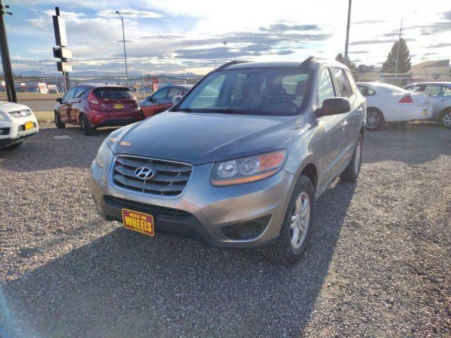 2011 Hyundai Santa Fe GLS 3.5 FWD (5XYZG4AG0BG) with an 3.5L V6 DOHC 24V engine, 6-Speed Automatic transmission, located at 4801 10th Ave S,, Great Falls, MT, 59405, (406) 564-1505, 0.000000, 0.000000 - Photo#0