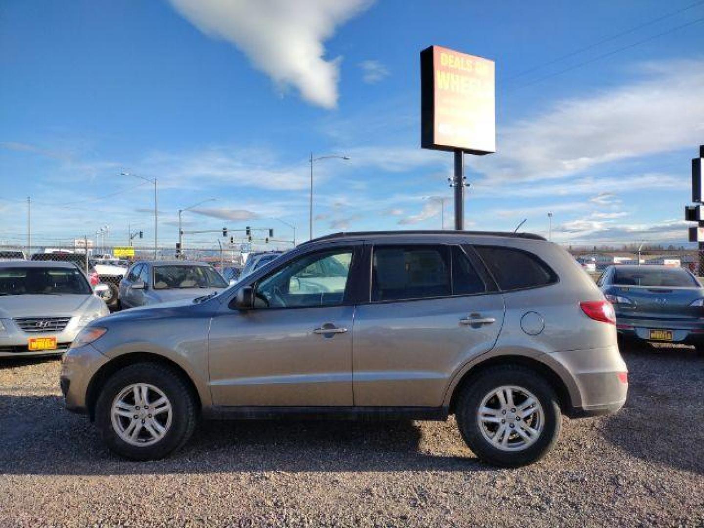 2011 Hyundai Santa Fe GLS 3.5 FWD (5XYZG4AG0BG) with an 3.5L V6 DOHC 24V engine, 6-Speed Automatic transmission, located at 4801 10th Ave S,, Great Falls, MT, 59405, (406) 564-1505, 0.000000, 0.000000 - Photo#1