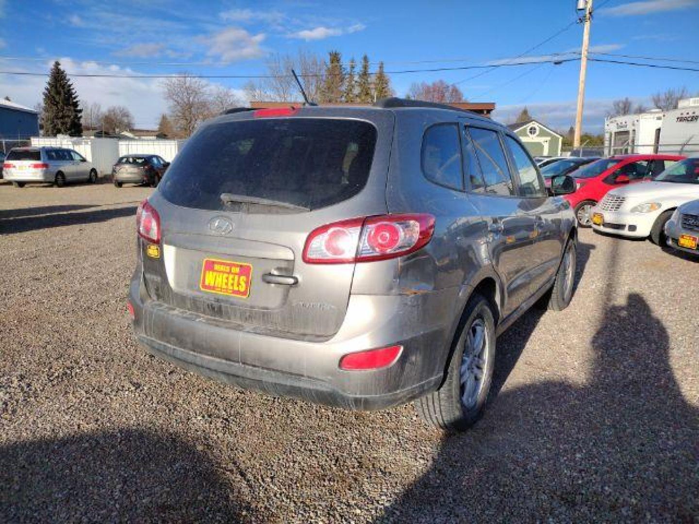 2011 Hyundai Santa Fe GLS 3.5 FWD (5XYZG4AG0BG) with an 3.5L V6 DOHC 24V engine, 6-Speed Automatic transmission, located at 4801 10th Ave S,, Great Falls, MT, 59405, (406) 564-1505, 0.000000, 0.000000 - Photo#4