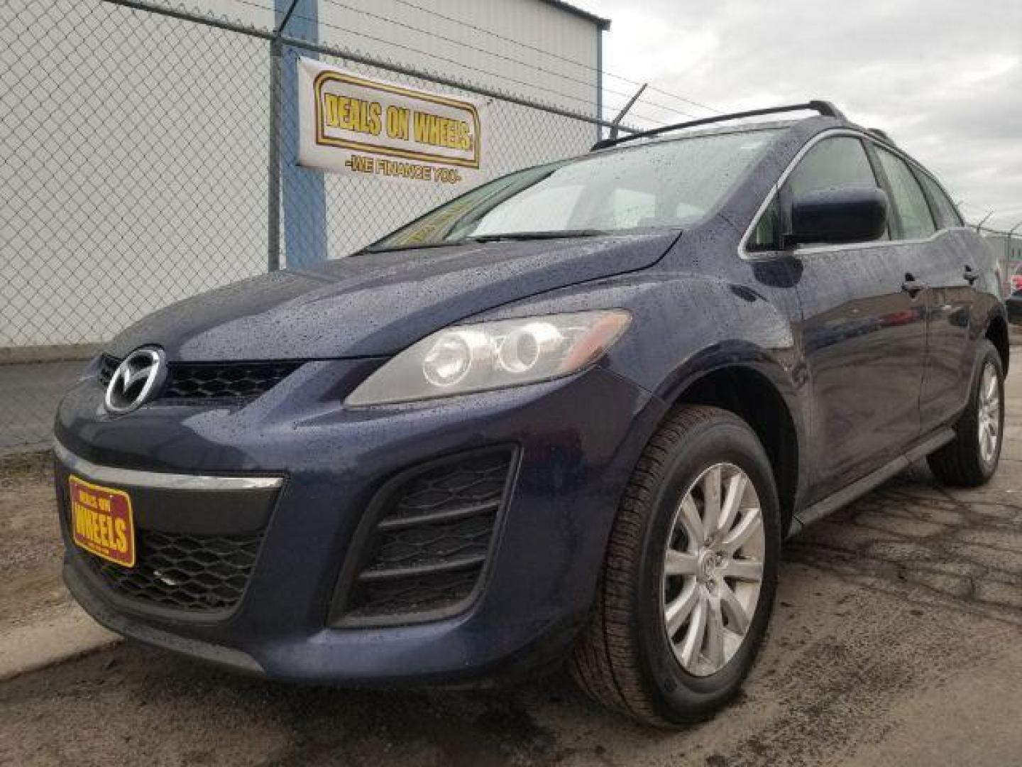 2011 Mazda CX-7 i SV (JM3ER2AM2B0) with an 2.5L L4 DOHC 16V engine, 5-Speed Automatic transmission, located at 601 E. Idaho St., Kalispell, MT, 59901, 0.000000, 0.000000 - Photo#0