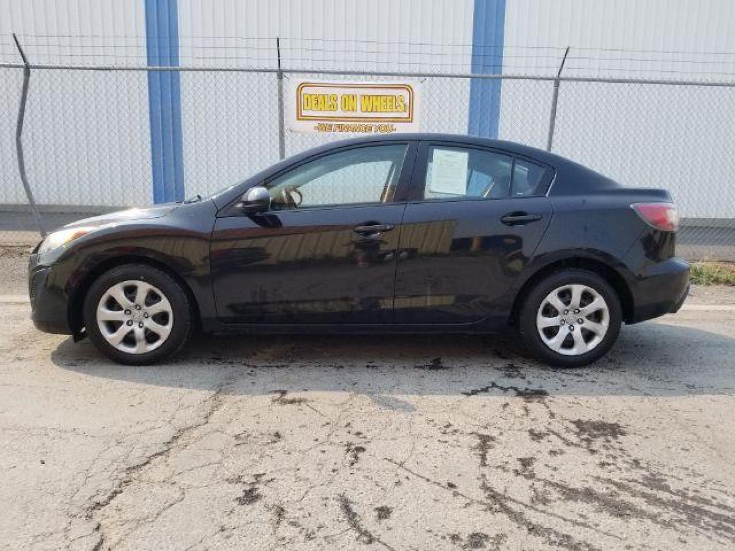 2011 Black Mica Mazda MAZDA3 i Sport 4-Door (JM1BL1UG6B1) with an 2.0L L4 DOHC 16V engine, located at 4801 10th Ave S,, Great Falls, MT, 59405, (406) 564-1505, 0.000000, 0.000000 - Photo#2