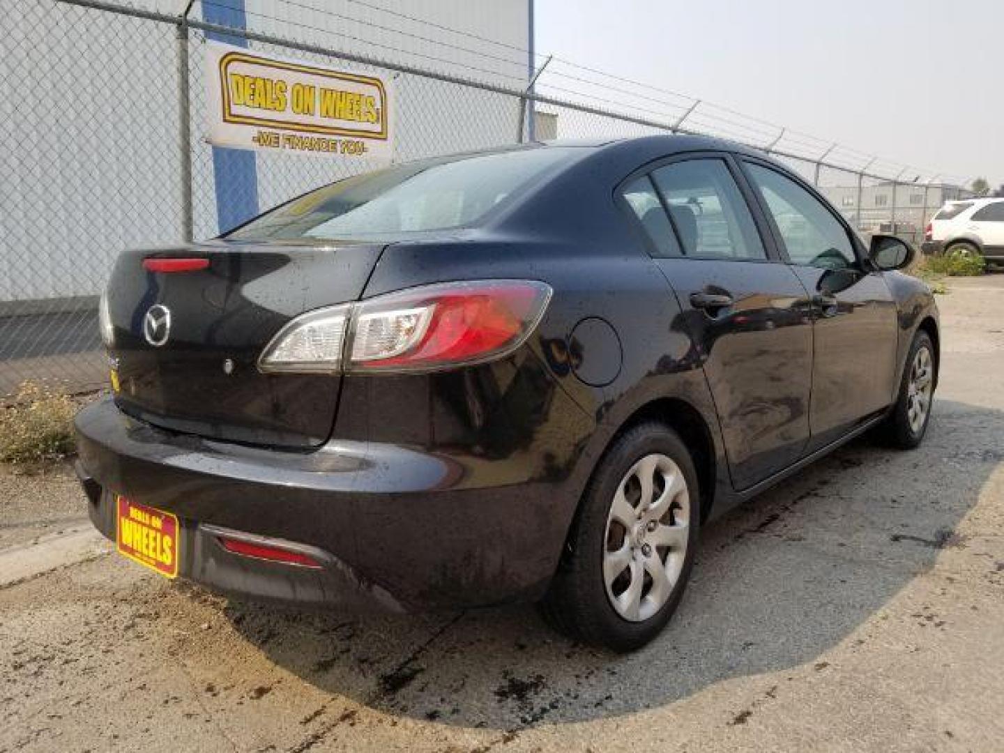 2011 Black Mica Mazda MAZDA3 i Sport 4-Door (JM1BL1UG6B1) with an 2.0L L4 DOHC 16V engine, located at 4801 10th Ave S,, Great Falls, MT, 59405, (406) 564-1505, 0.000000, 0.000000 - Photo#4