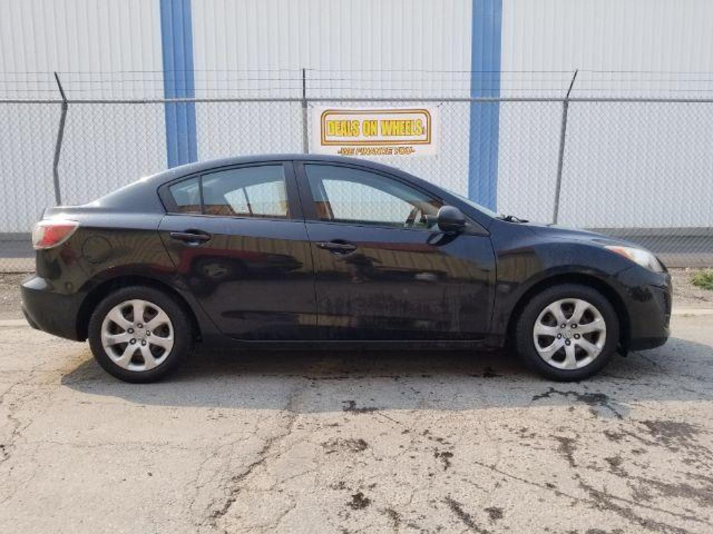 2011 Black Mica Mazda MAZDA3 i Sport 4-Door (JM1BL1UG6B1) with an 2.0L L4 DOHC 16V engine, located at 4801 10th Ave S,, Great Falls, MT, 59405, (406) 564-1505, 0.000000, 0.000000 - Photo#5