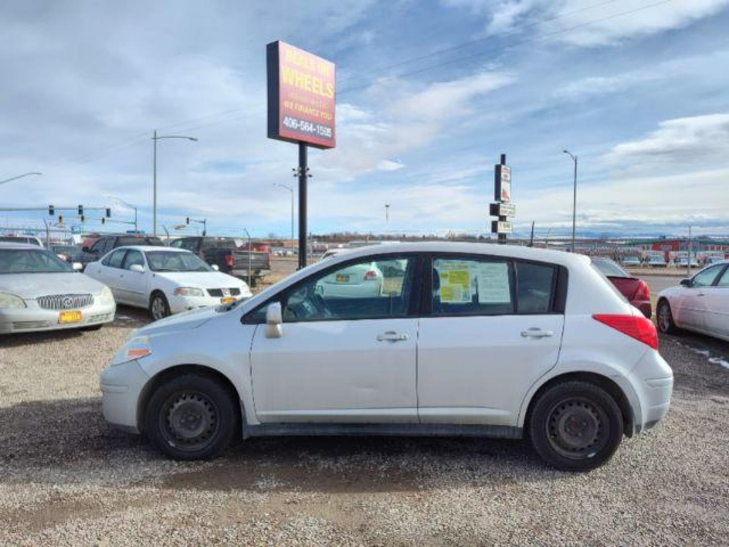 2011 Nissan Versa 1.8 SL Hatchback (3N1BC1CP9BL) with an 1.8L L4 DOHC 16V engine, 6 Speed Manual Trans transmission, located at 4801 10th Ave S,, Great Falls, MT, 59405, (406) 564-1505, 0.000000, 0.000000 - Photo#1