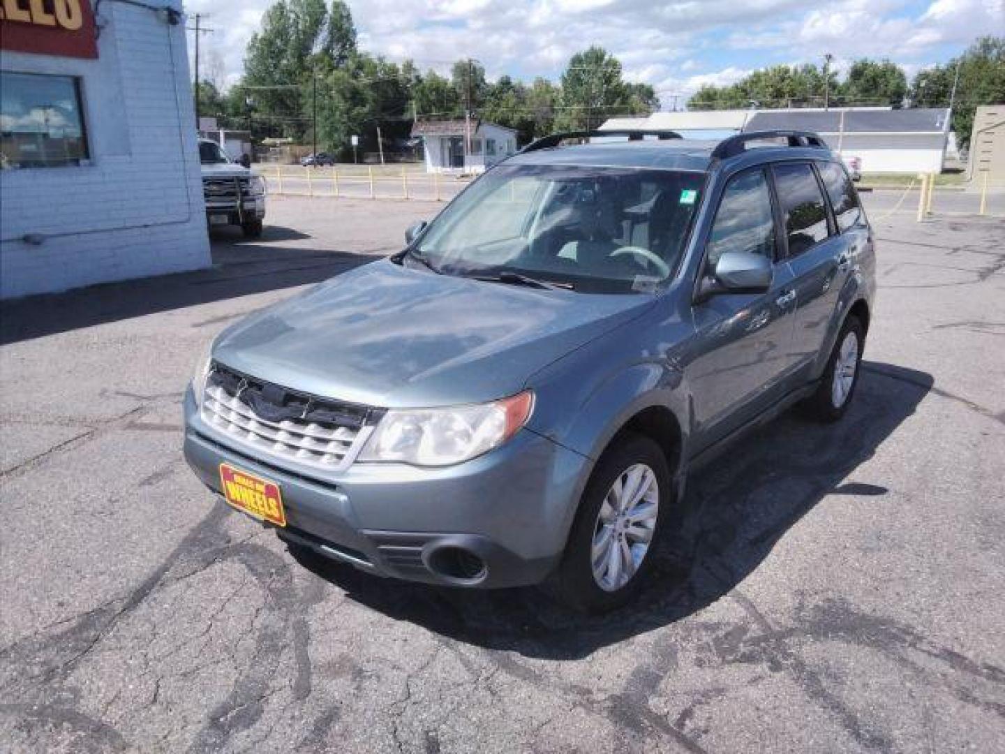 2011 Subaru Forester 2.5X Premium (JF2SHBDC7BH) with an 2.5L H4 SOHC 16V engine, 4-Speed Automatic transmission, located at 4047 Montana Ave., Billings, MT, 59101, 45.770847, -108.529800 - Photo#0