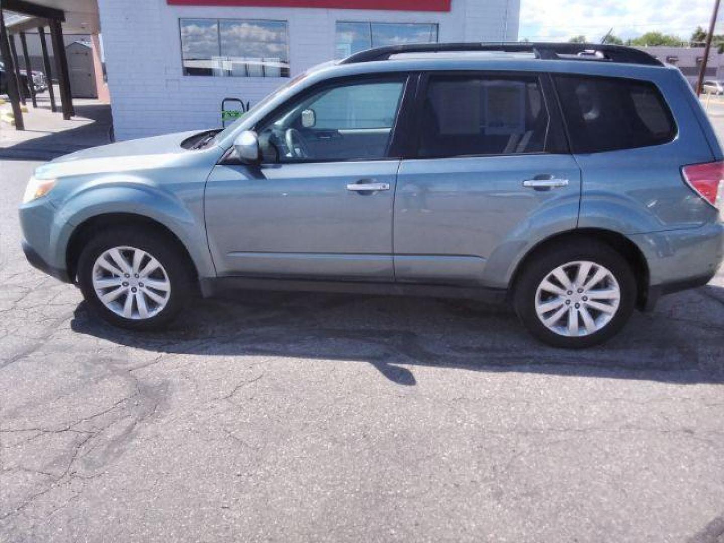 2011 Subaru Forester 2.5X Premium (JF2SHBDC7BH) with an 2.5L H4 SOHC 16V engine, 4-Speed Automatic transmission, located at 4047 Montana Ave., Billings, MT, 59101, 45.770847, -108.529800 - Photo#1