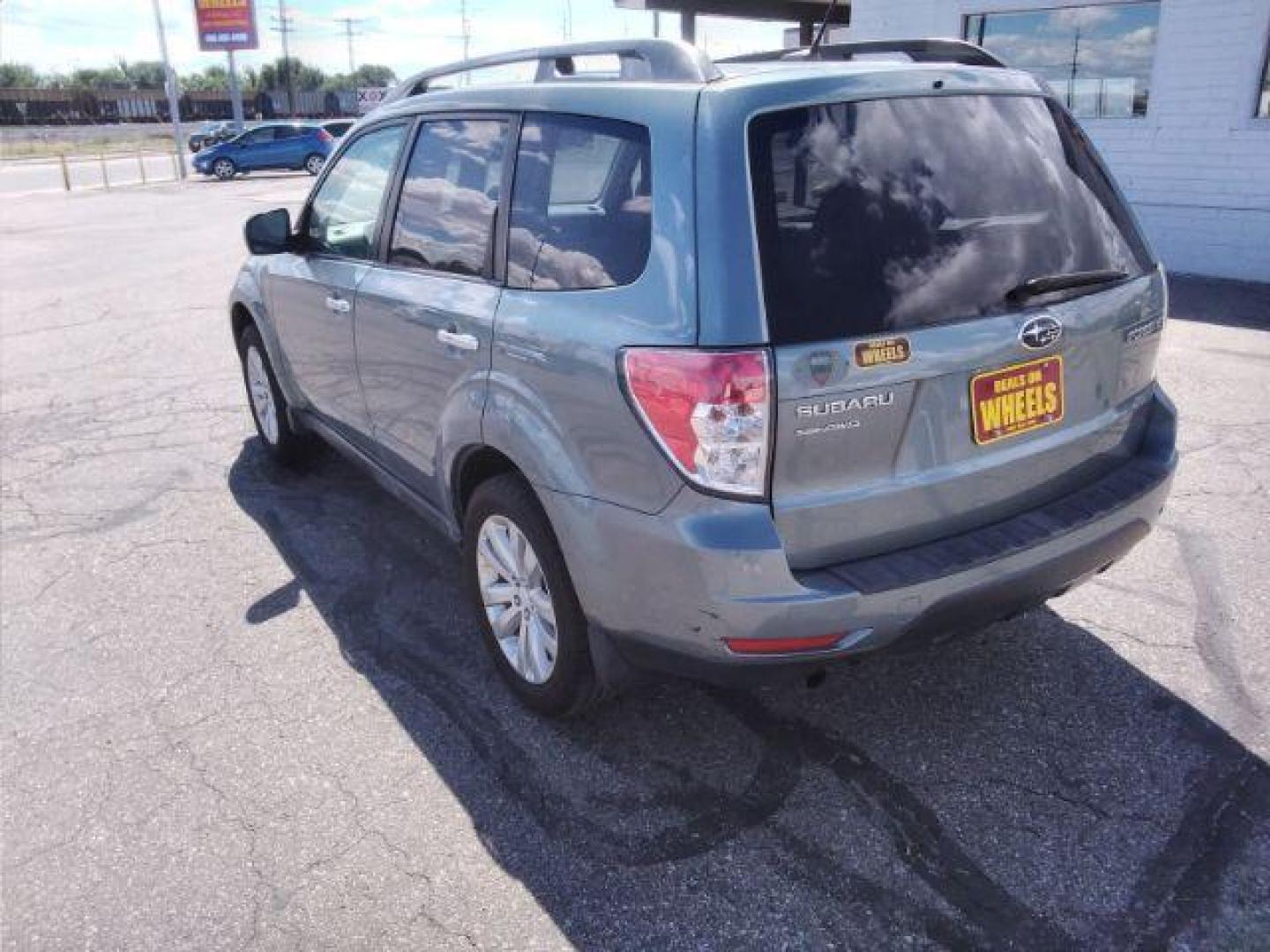 2011 Subaru Forester 2.5X Premium (JF2SHBDC7BH) with an 2.5L H4 SOHC 16V engine, 4-Speed Automatic transmission, located at 4047 Montana Ave., Billings, MT, 59101, 45.770847, -108.529800 - Photo#2