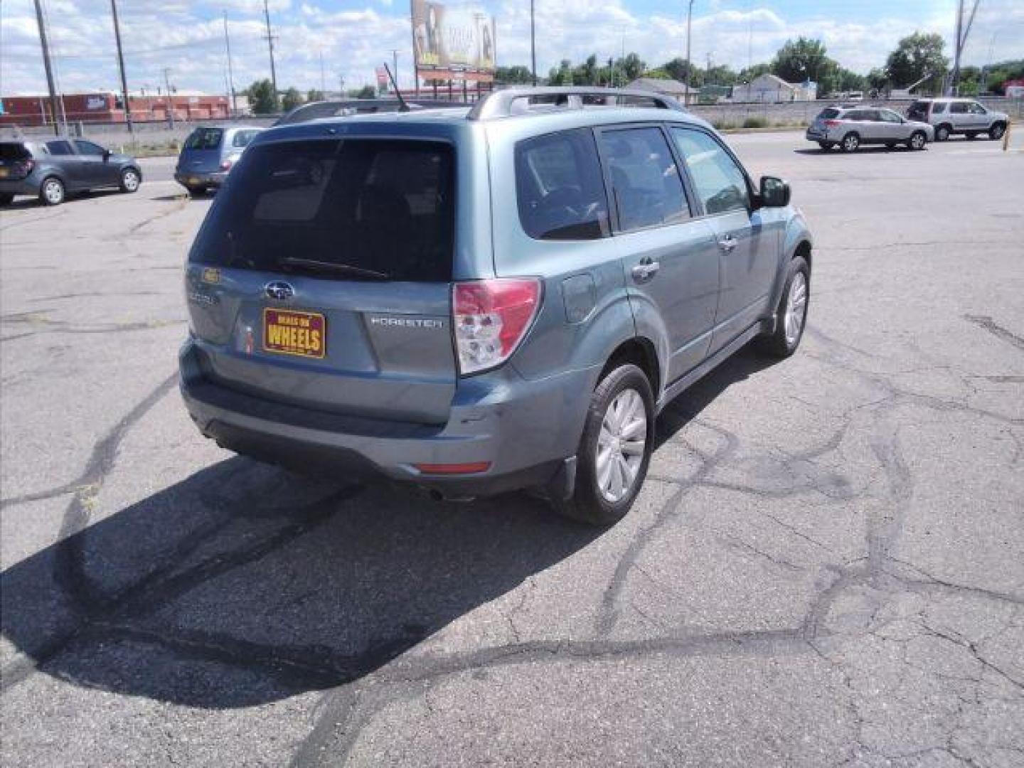 2011 Subaru Forester 2.5X Premium (JF2SHBDC7BH) with an 2.5L H4 SOHC 16V engine, 4-Speed Automatic transmission, located at 4047 Montana Ave., Billings, MT, 59101, 45.770847, -108.529800 - Photo#4