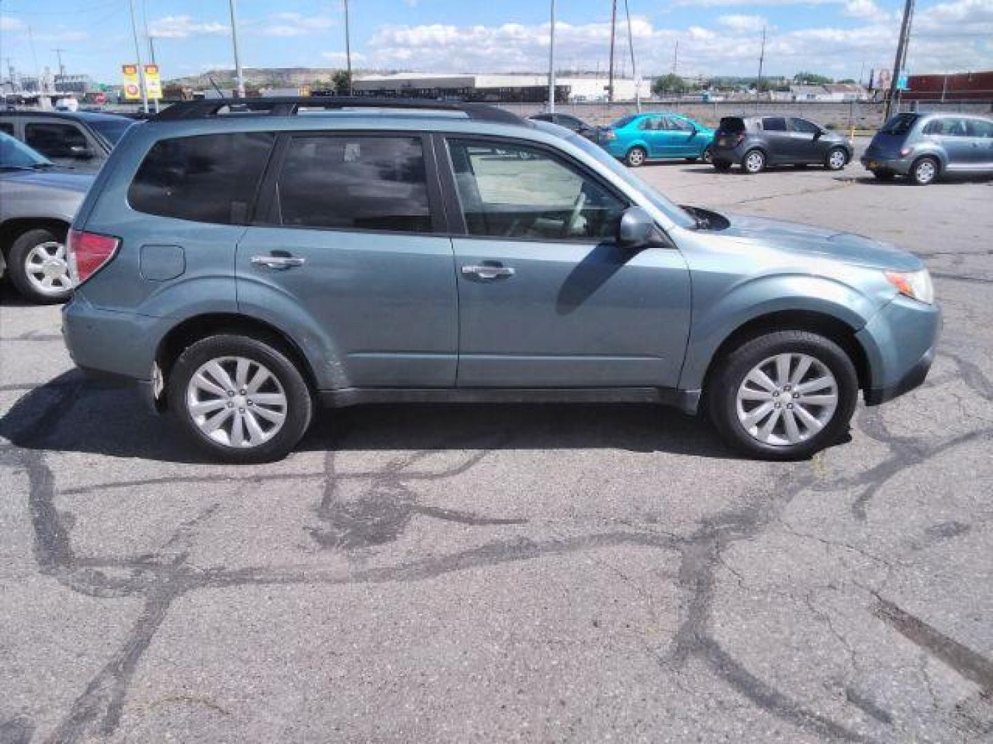 2011 Subaru Forester 2.5X Premium (JF2SHBDC7BH) with an 2.5L H4 SOHC 16V engine, 4-Speed Automatic transmission, located at 4047 Montana Ave., Billings, MT, 59101, 45.770847, -108.529800 - Photo#5