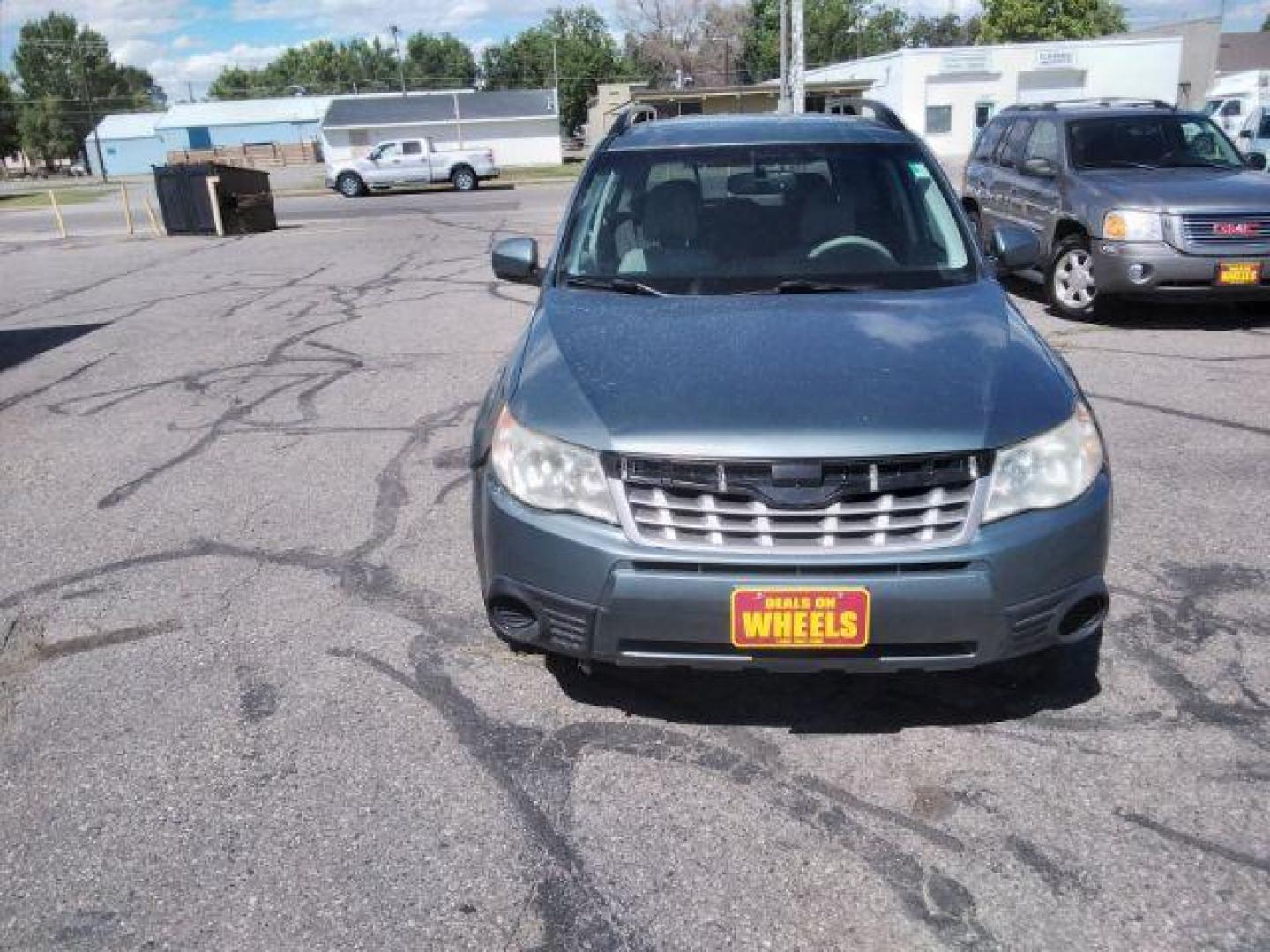 2011 Subaru Forester 2.5X Premium (JF2SHBDC7BH) with an 2.5L H4 SOHC 16V engine, 4-Speed Automatic transmission, located at 4047 Montana Ave., Billings, MT, 59101, 45.770847, -108.529800 - Photo#7