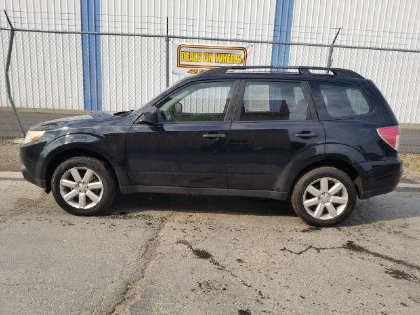 2011 Subaru Forester 2.5X Touring (JF2SHABC4BH) with an 2.5L H4 SOHC 16V engine, 4-Speed Automatic transmission, located at 4047 Montana Ave., Billings, MT, 59101, 45.770847, -108.529800 - Photo#2