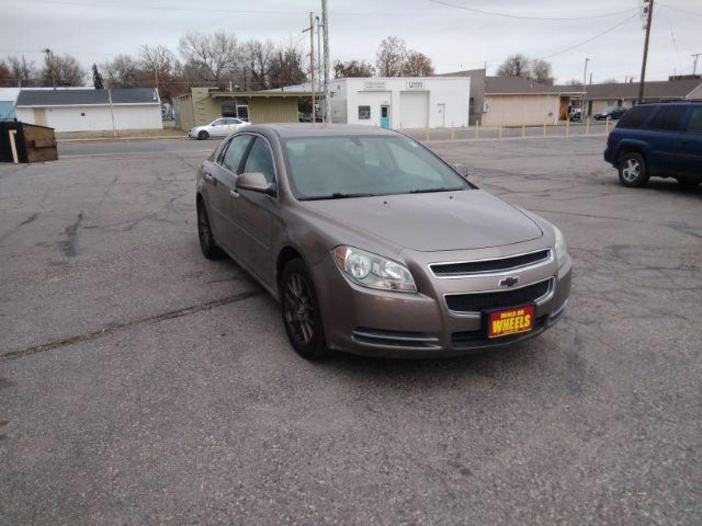 2012 Mocha Steel Metallic Chevrolet Malibu 2LT (1G1ZD5E05CF) with an 2.4L L4 DOHC 16V engine, 6-Speed Automatic transmission, located at 4047 Montana Ave., Billings, MT, 59101, 45.770847, -108.529800 - Photo#2