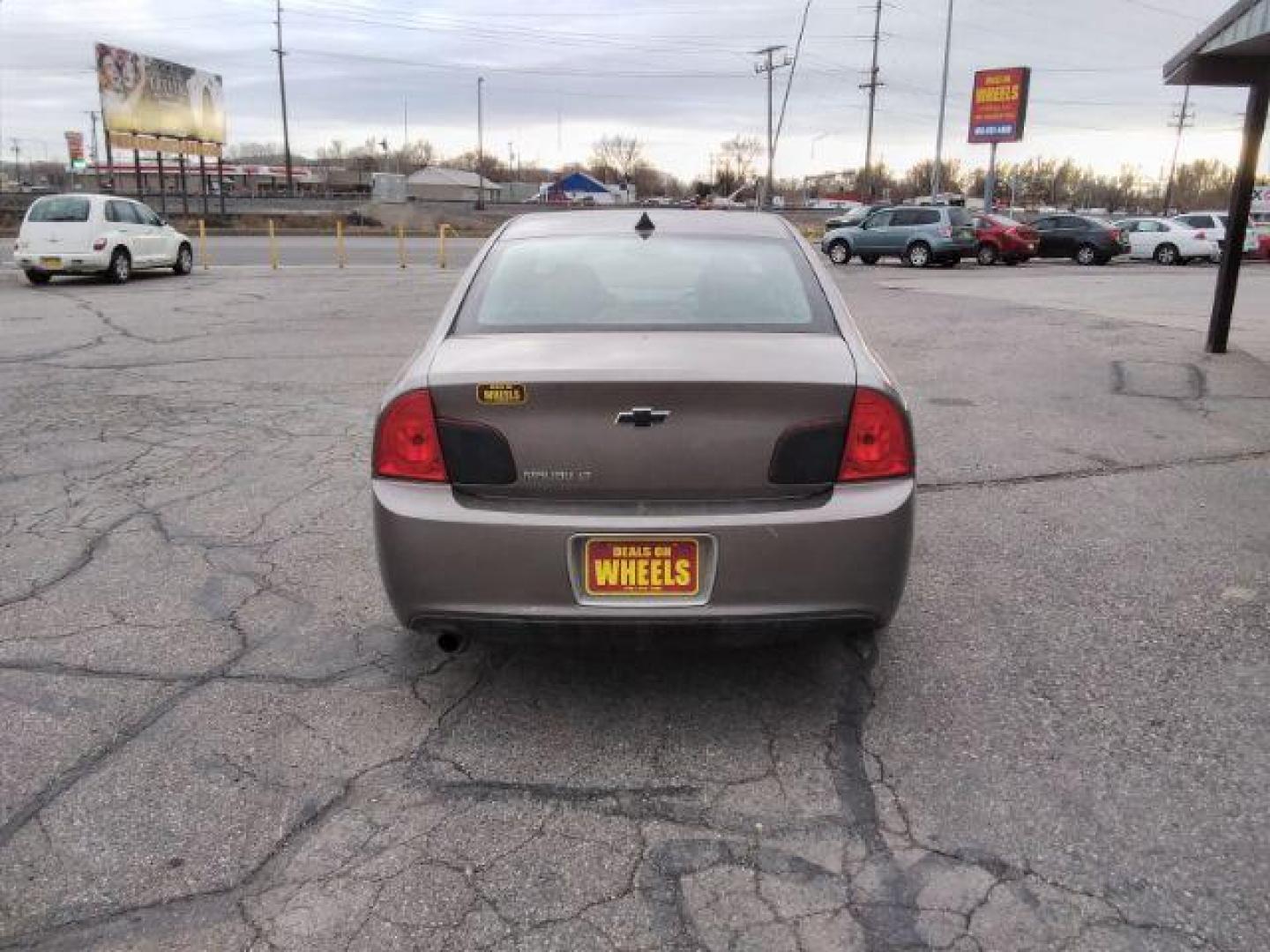 2012 Mocha Steel Metallic Chevrolet Malibu 2LT (1G1ZD5E05CF) with an 2.4L L4 DOHC 16V engine, 6-Speed Automatic transmission, located at 4047 Montana Ave., Billings, MT, 59101, 45.770847, -108.529800 - Photo#5