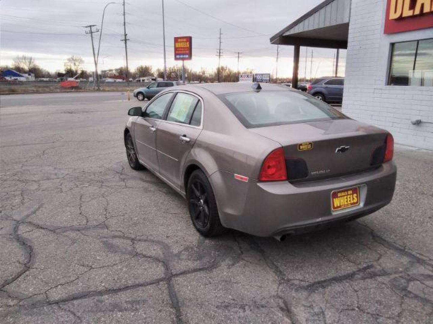 2012 Mocha Steel Metallic Chevrolet Malibu 2LT (1G1ZD5E05CF) with an 2.4L L4 DOHC 16V engine, 6-Speed Automatic transmission, located at 4047 Montana Ave., Billings, MT, 59101, 45.770847, -108.529800 - Photo#6