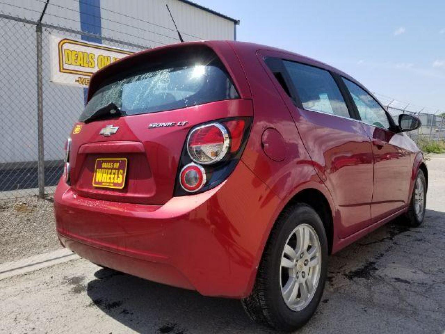 2012 Chevrolet Sonic 2LT 5-Door (1G1JC6SH6C4) with an 1.8L L4 DOHC 24V engine, 6-Speed Automatic transmission, located at 4801 10th Ave S,, Great Falls, MT, 59405, (406) 564-1505, 0.000000, 0.000000 - Photo#4