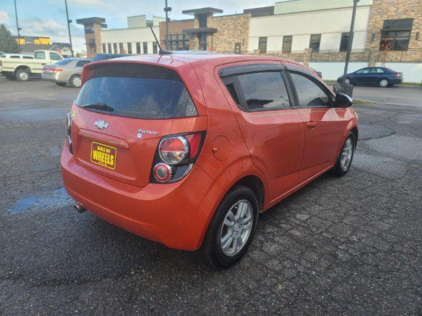 2012 Chevrolet Sonic 1LS 5-Door (1G1JB6SH8C4) with an 1.8L L4 DOHC 24V engine, 5-Speed Manual transmission, located at 1800 West Broadway, Missoula, 59808, (406) 543-1986, 46.881348, -114.023628 - Photo#3