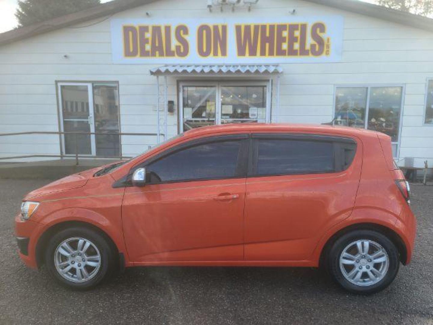 2012 Chevrolet Sonic 1LS 5-Door (1G1JB6SH8C4) with an 1.8L L4 DOHC 24V engine, 5-Speed Manual transmission, located at 1800 West Broadway, Missoula, 59808, (406) 543-1986, 46.881348, -114.023628 - Photo#5