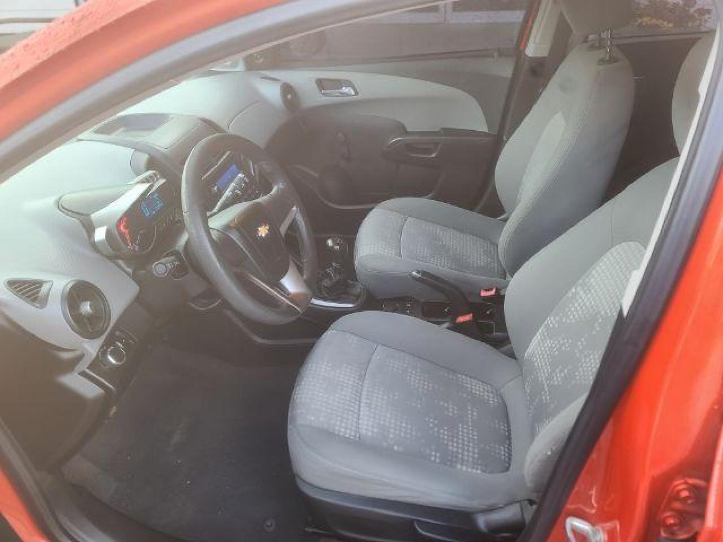 2012 Chevrolet Sonic 1LS 5-Door (1G1JB6SH8C4) with an 1.8L L4 DOHC 24V engine, 5-Speed Manual transmission, located at 1800 West Broadway, Missoula, 59808, (406) 543-1986, 46.881348, -114.023628 - Photo#6