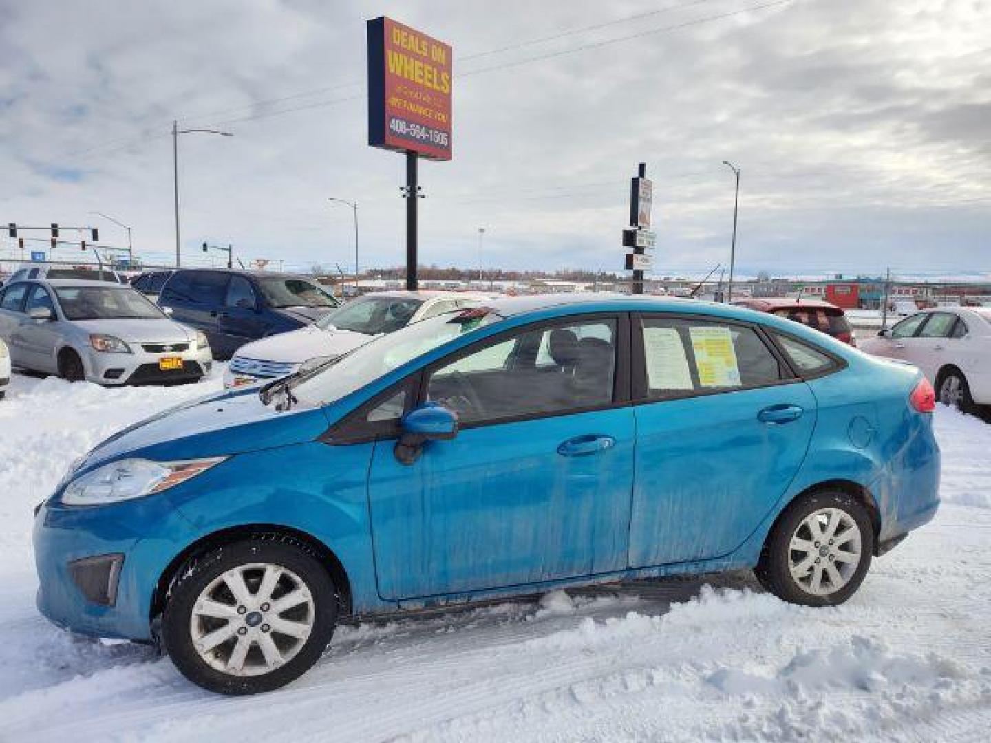 2012 Ford Fiesta SE Sedan (3FADP4BJ6CM) with an 1.6L L4 DOHC 16V engine, located at 4801 10th Ave S,, Great Falls, MT, 59405, (406) 564-1505, 0.000000, 0.000000 - Photo#1