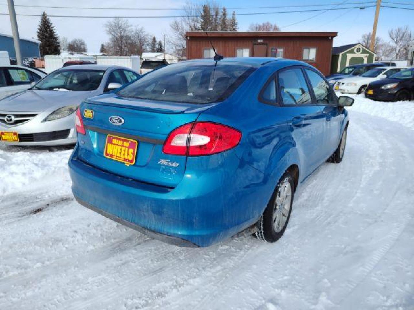 2012 Ford Fiesta SE Sedan (3FADP4BJ6CM) with an 1.6L L4 DOHC 16V engine, located at 4801 10th Ave S,, Great Falls, MT, 59405, (406) 564-1505, 0.000000, 0.000000 - Photo#4