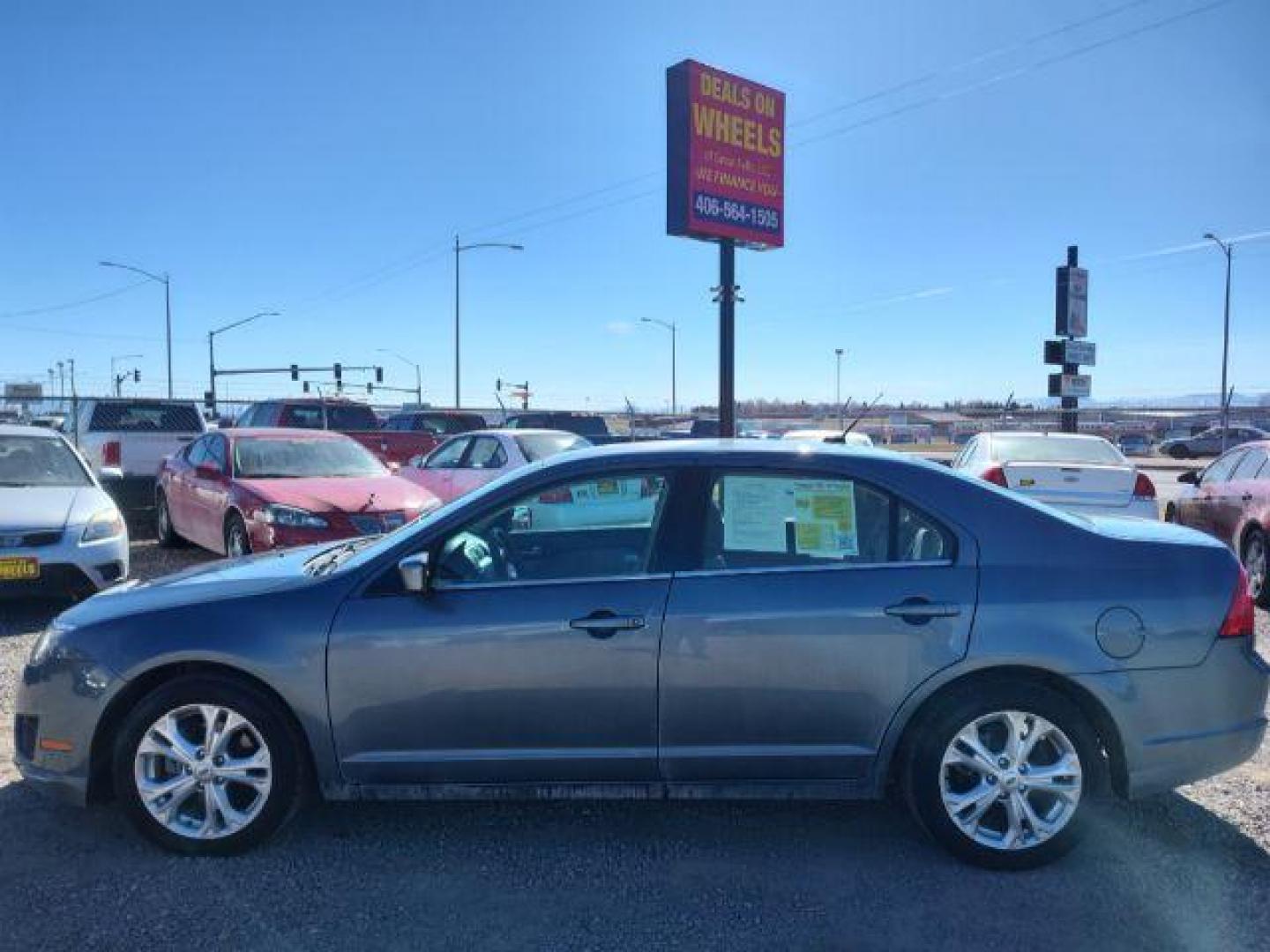 2012 Ford Fusion SE (3FAHP0HA0CR) with an 2.5L L4 DOHC 16V engine, located at 4801 10th Ave S,, Great Falls, MT, 59405, (406) 564-1505, 0.000000, 0.000000 - Photo#1