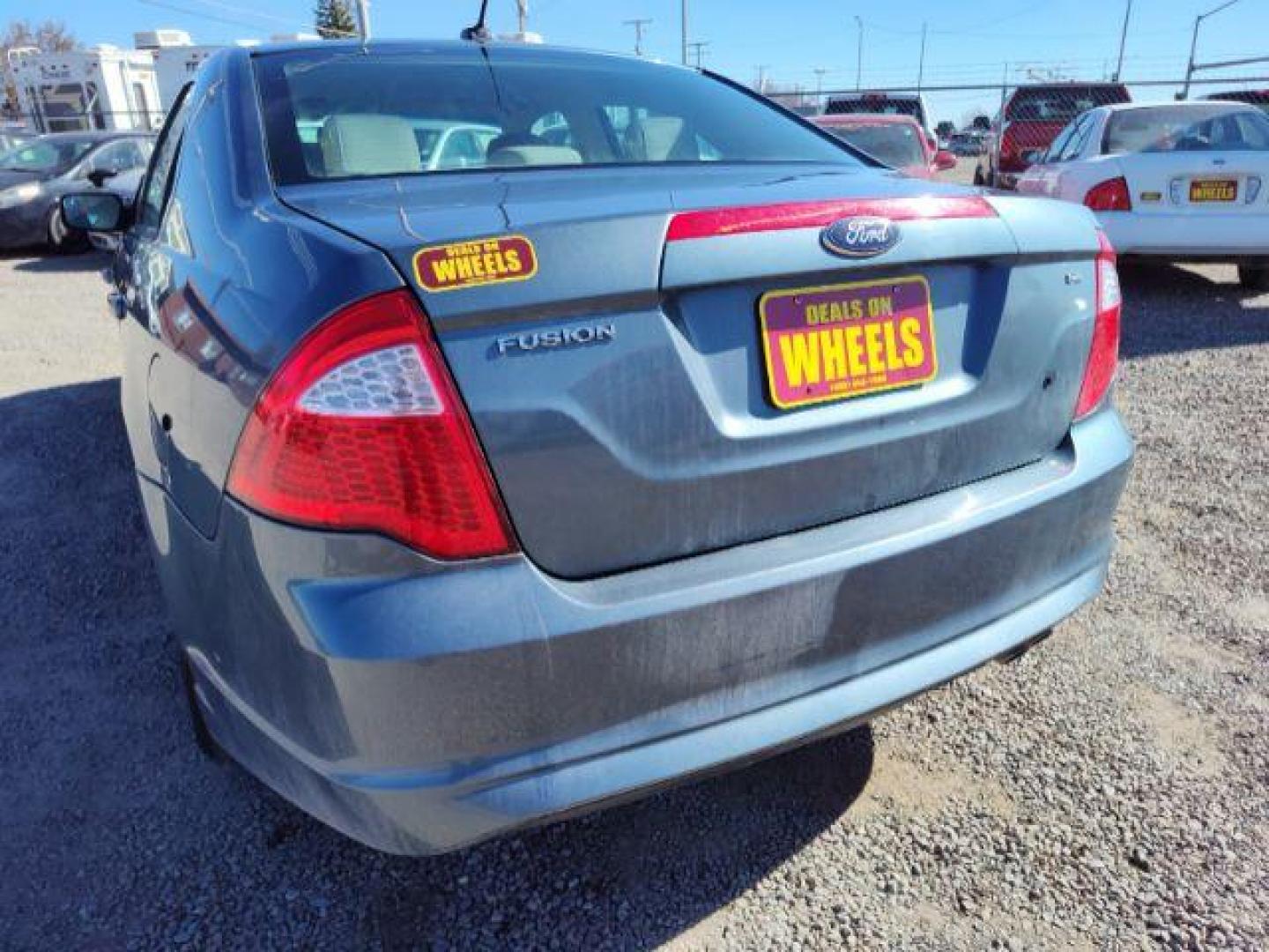 2012 Ford Fusion SE (3FAHP0HA0CR) with an 2.5L L4 DOHC 16V engine, located at 4801 10th Ave S,, Great Falls, MT, 59405, (406) 564-1505, 0.000000, 0.000000 - Photo#2