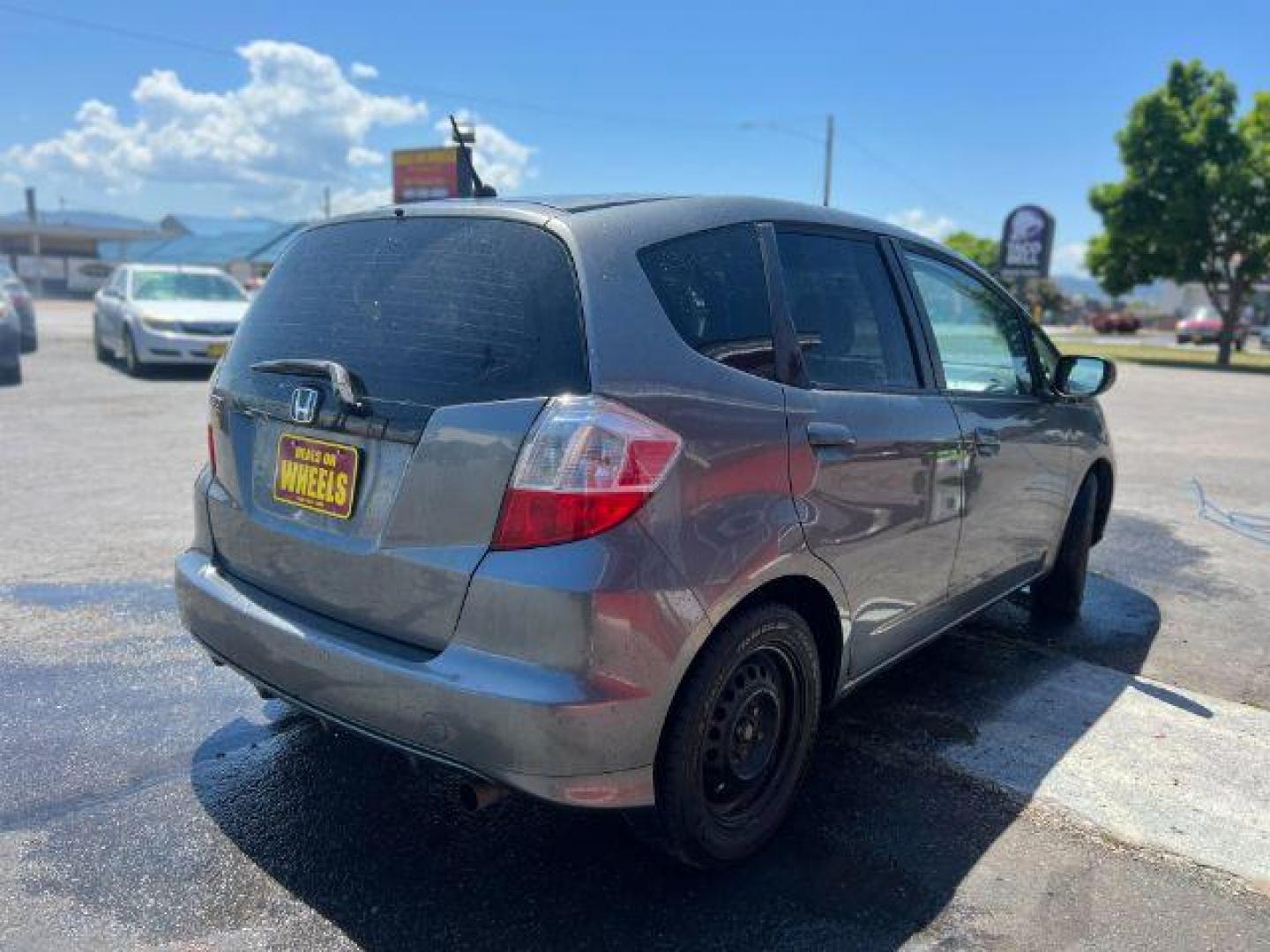 2012 Honda Fit 5-Speed MT (JHMGE8G34CC) with an 1.5L L4 SOHC 16V engine, 5-Speed Manual transmission, located at 601 E. Idaho St., Kalispell, MT, 59901, 0.000000, 0.000000 - Photo#5