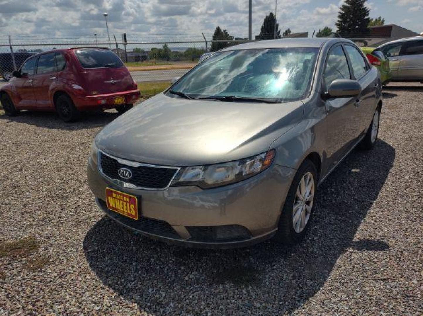 2012 Kia Forte EX (KNAFU4A23C5) with an 2.0L L4 DOHC 16V engine, located at 4801 10th Ave S,, Great Falls, MT, 59405, (406) 564-1505, 0.000000, 0.000000 - Photo#0