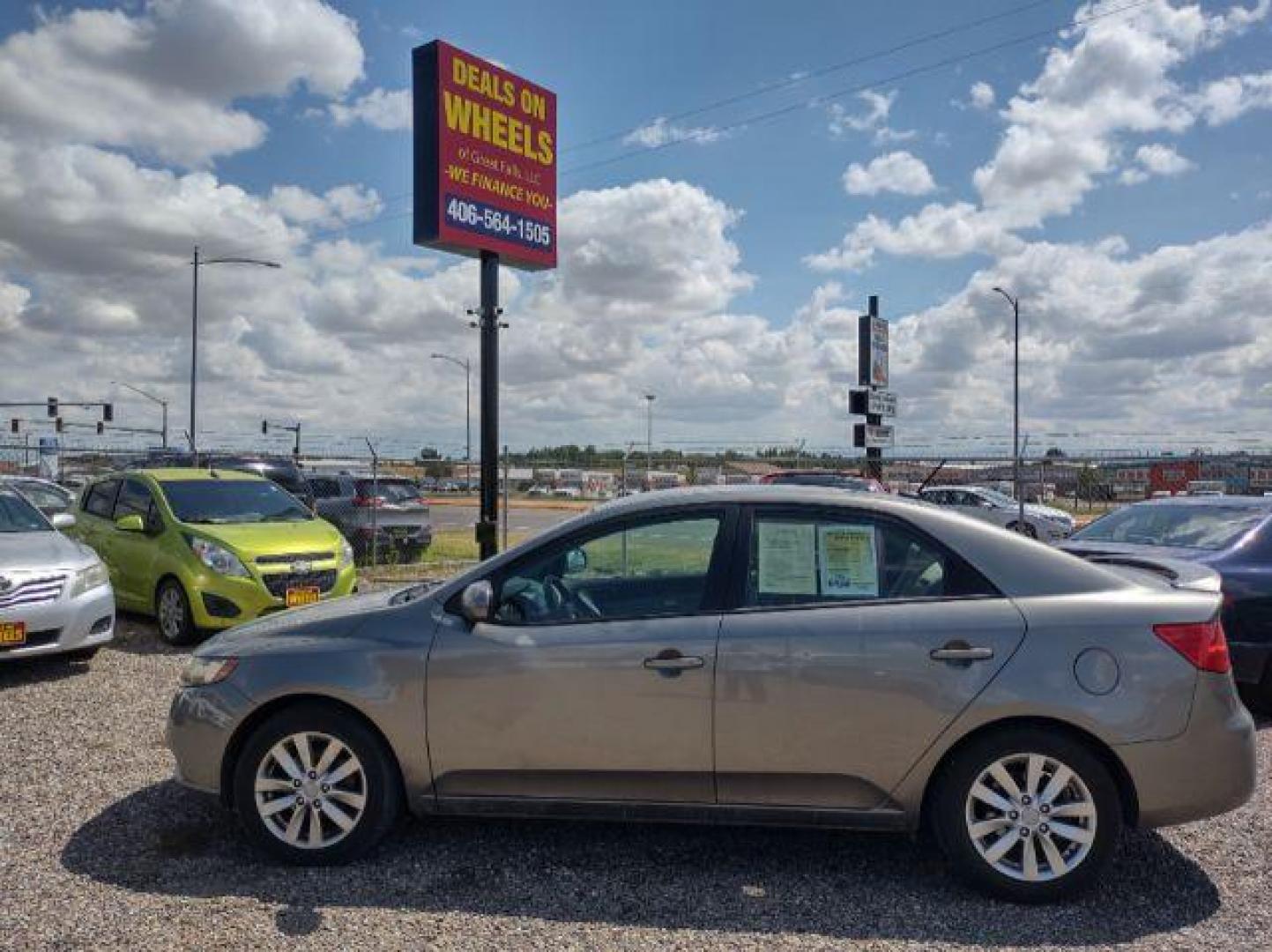 2012 Kia Forte EX (KNAFU4A23C5) with an 2.0L L4 DOHC 16V engine, located at 4801 10th Ave S,, Great Falls, MT, 59405, (406) 564-1505, 0.000000, 0.000000 - Photo#1