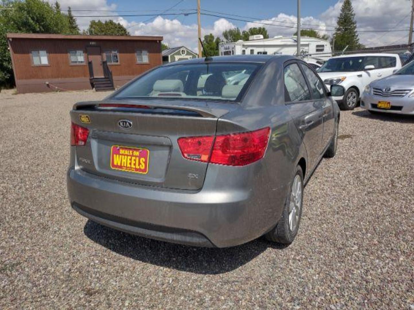 2012 Kia Forte EX (KNAFU4A23C5) with an 2.0L L4 DOHC 16V engine, located at 4801 10th Ave S,, Great Falls, MT, 59405, (406) 564-1505, 0.000000, 0.000000 - Photo#4